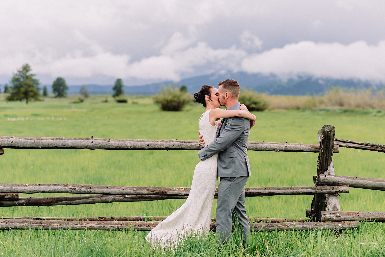 bride and groom kissing ranch wedding island park