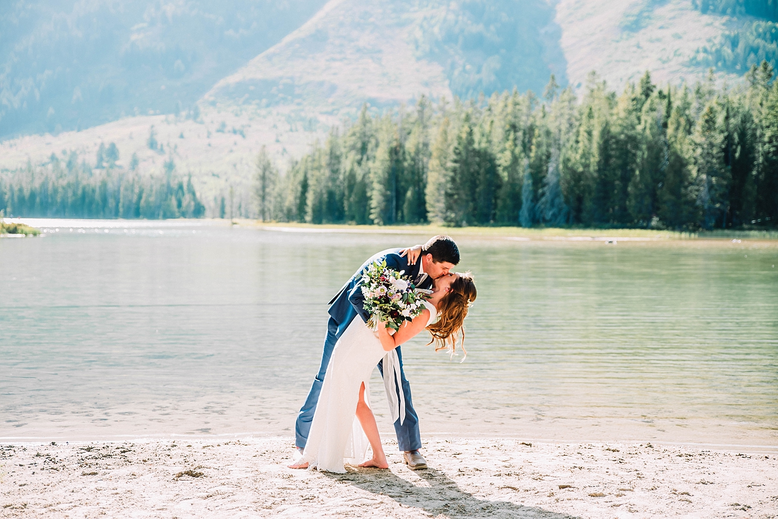 Couple kissing and celebrating Jackson Hole elopement in 6 months 