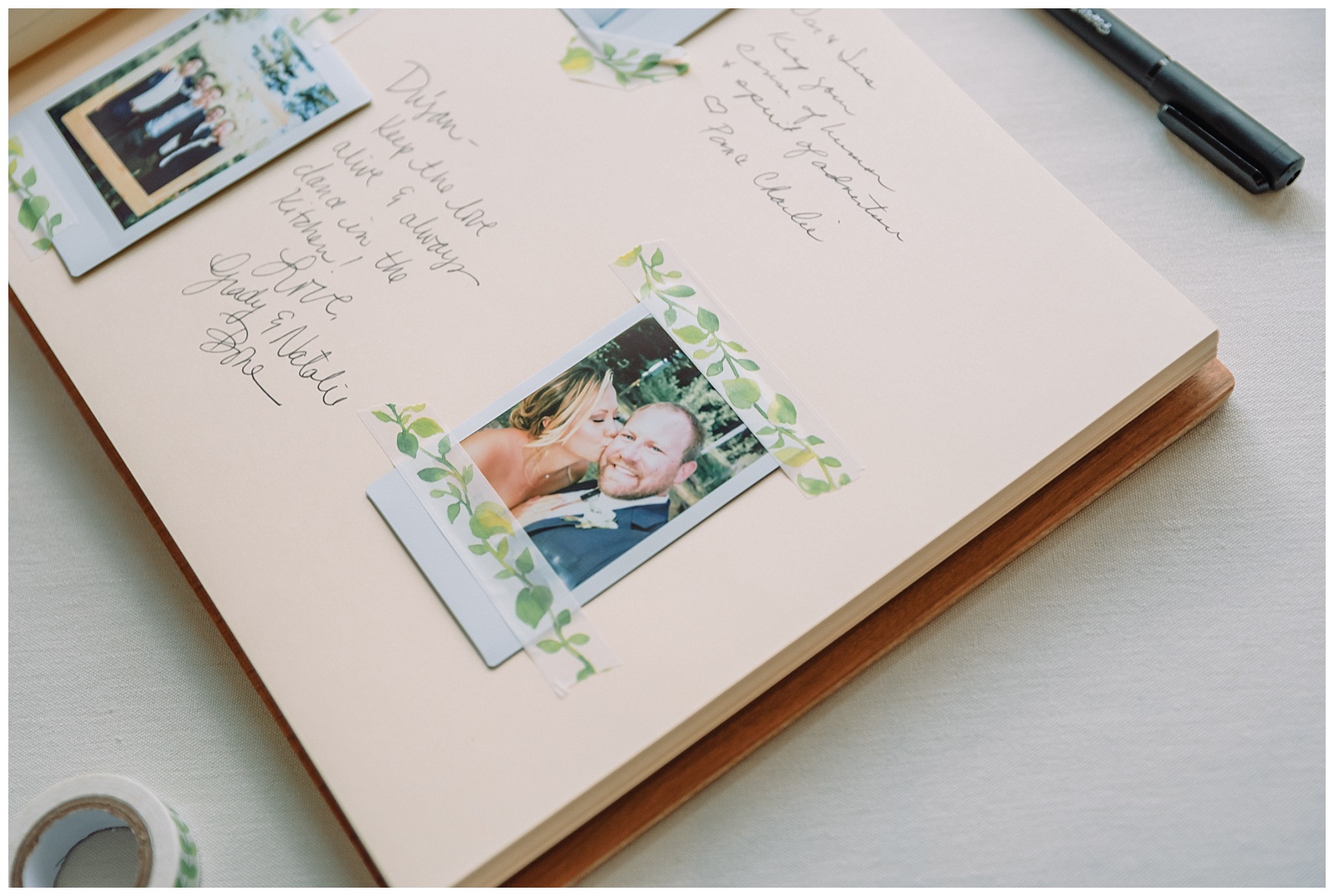 polaroid sign in book with decorative washi tape