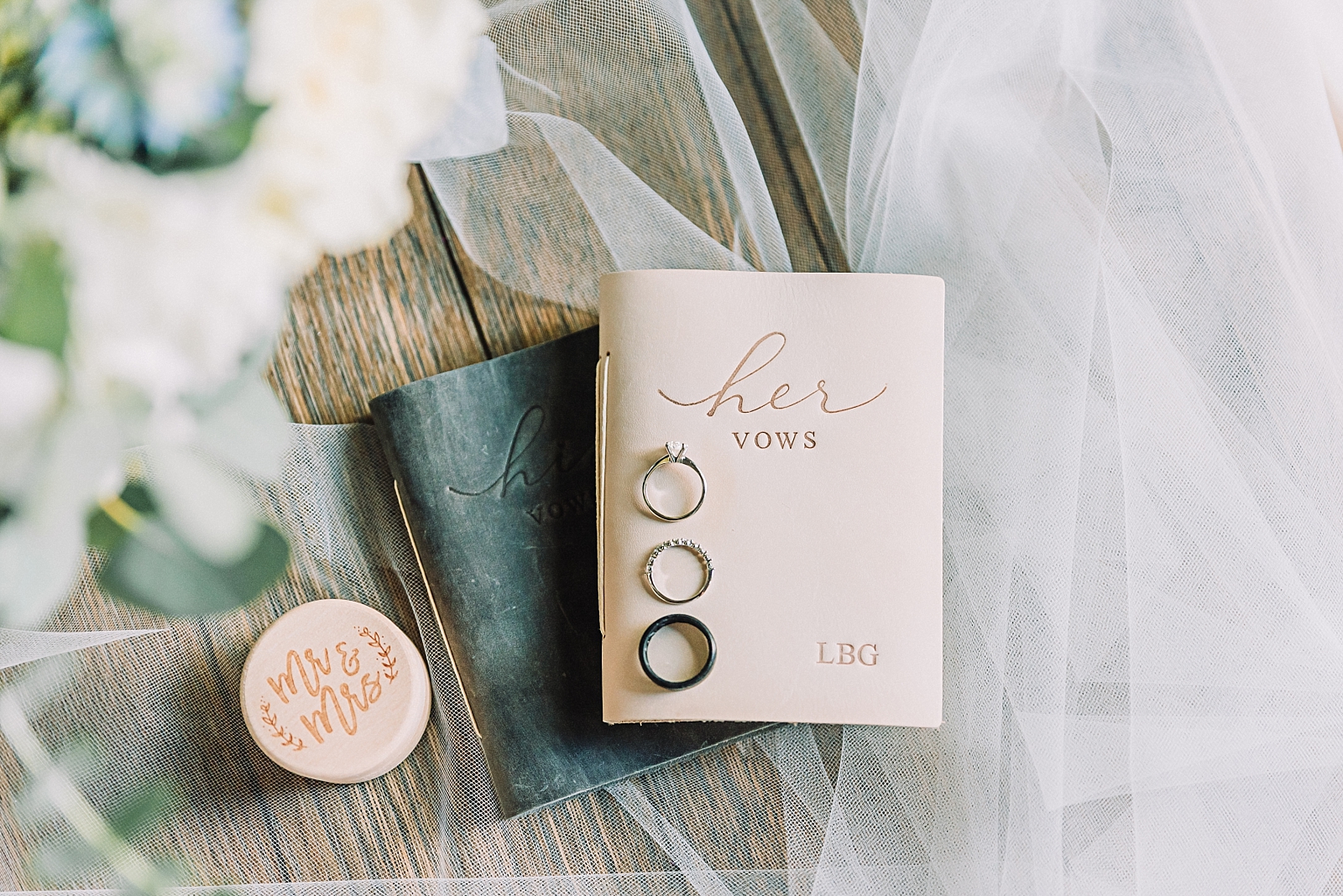 wedding rings, bouquet, vow books