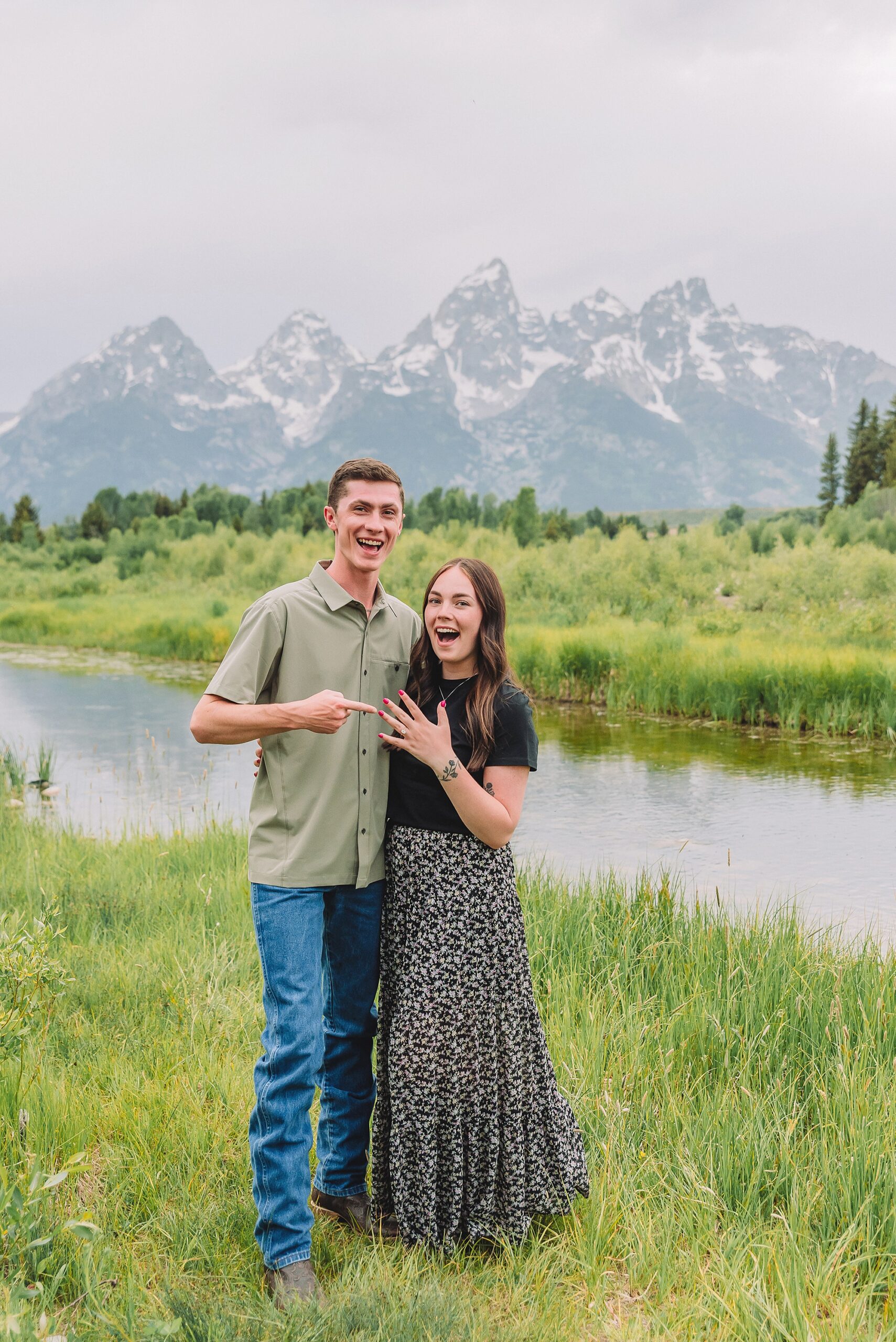 Jackson Hole Engagement Photographer at Mormon Row North Jackson Hole Engagement Photographer for summer sessions in Grand Teton National Park Couple poses ideas for playful engagement photos in Jackson Hole Jackson Hole engagement photos at Schwabacher Landing Rendezvous Mountain proposal and Jackson Hole engagement photographer