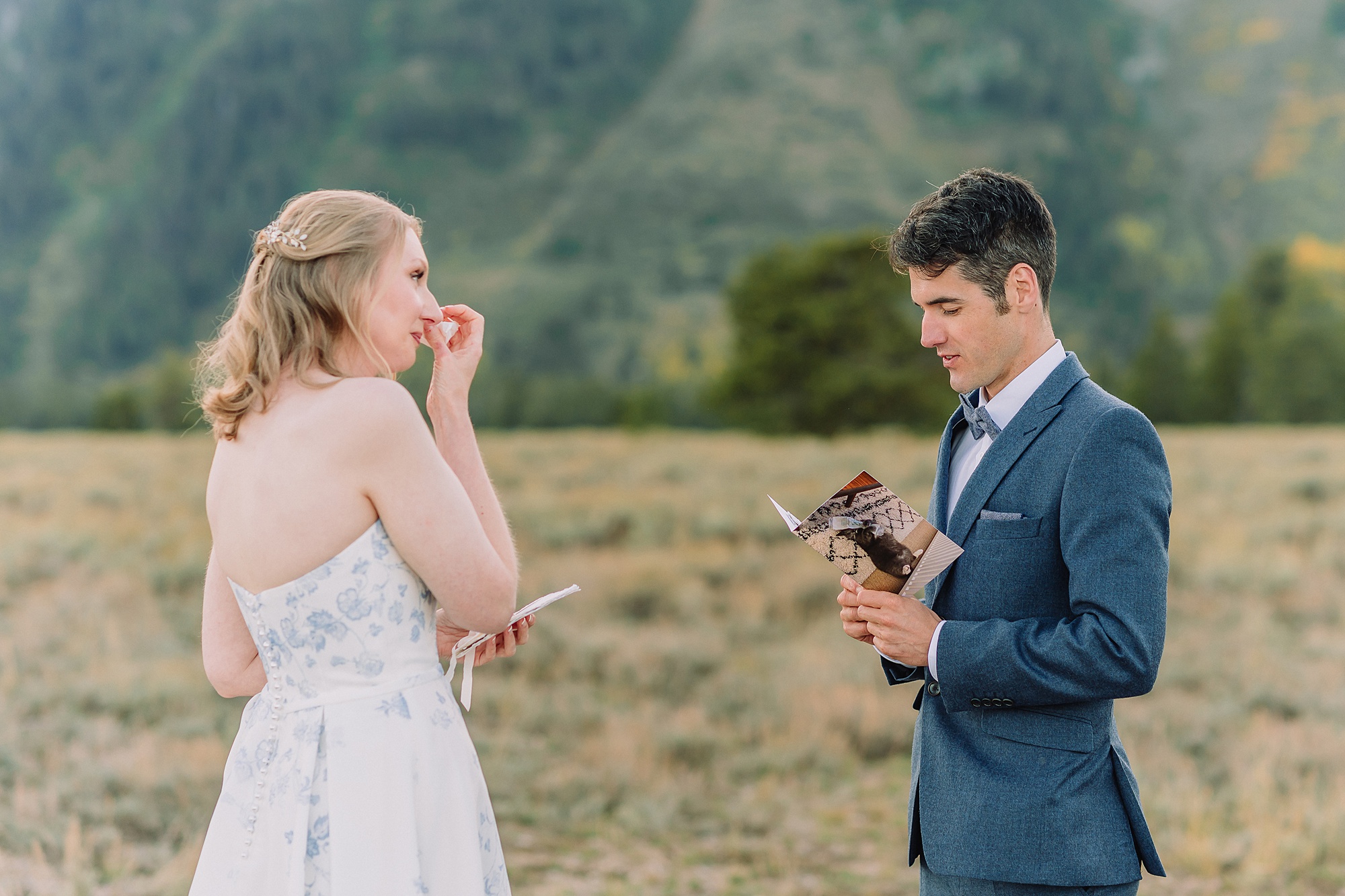 bride and groom share vows while wedding officiant performs ceremony at Cathedral Group Turnout