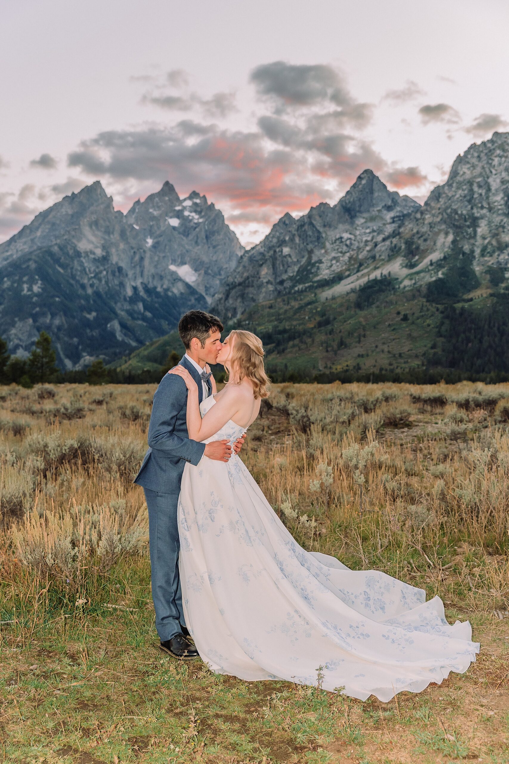 Grand Tetons Elopement photos at sunset with bride and groom kissing