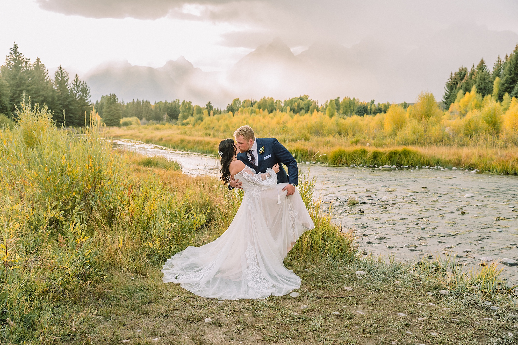 bride and groom at schwabacher landing in Grand Teton Elopement