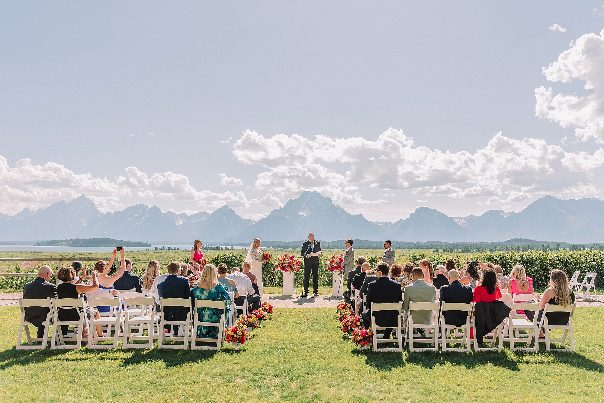 Jackson Lake Lodge wedding with Mount Moran view July wedding at Jackson Lake Lodge Wyoming Wyoming destination wedding in the Tetons outdoor wedding ceremony in Grand Teton National Park