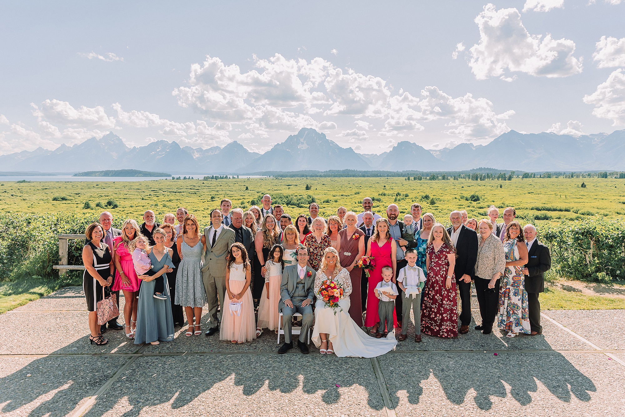 Jackson Hole luxury mountain wedding reception Jackson Hole destination wedding photographer sunset wedding portraits in the Tetons intimate Jackson Lake Lodge wedding celebration summer wedding in grand teton national park
