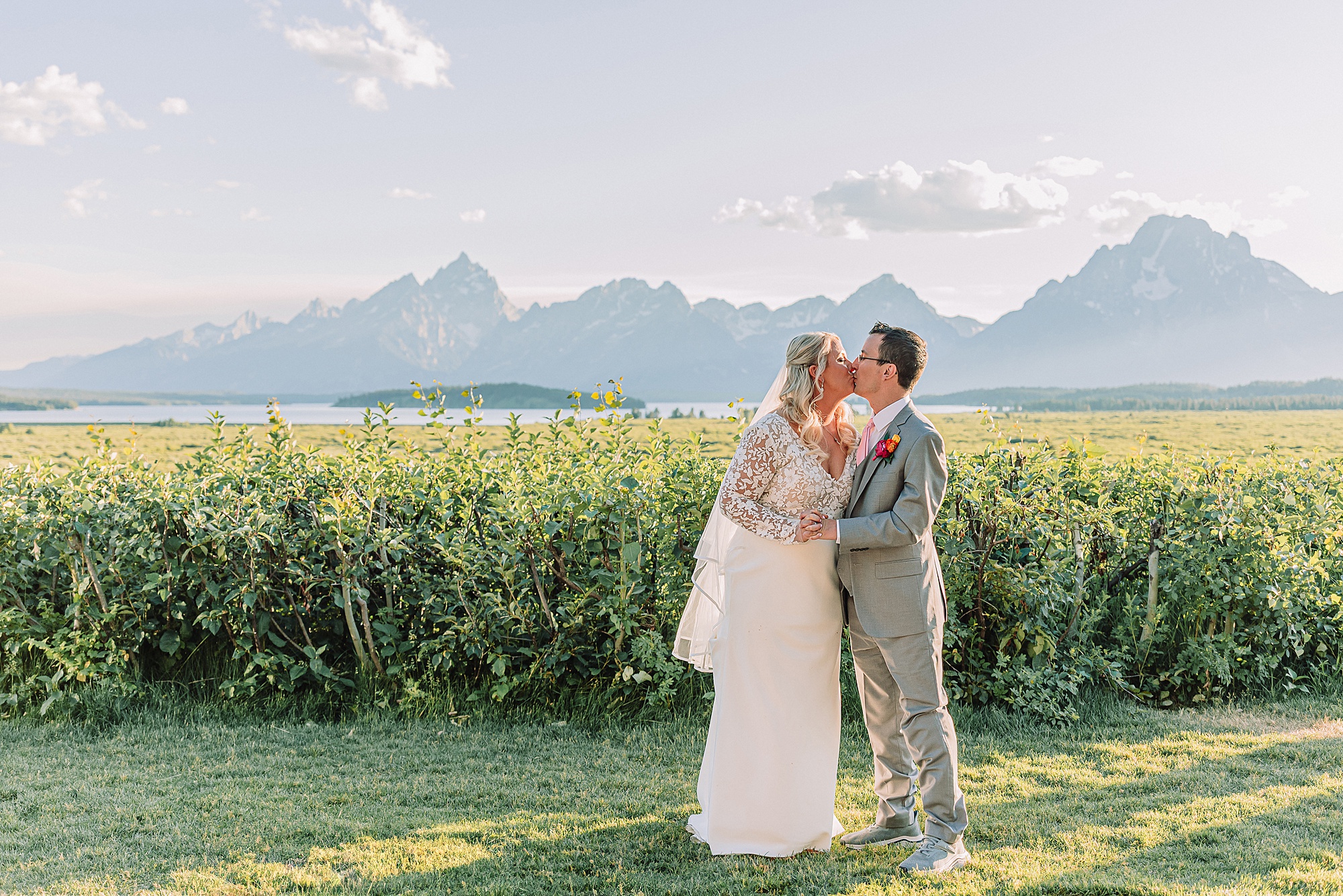 Jackson Lake Lodge wedding with Mount Moran view July wedding at Jackson Lake Lodge Wyoming Wyoming destination wedding in the Tetons outdoor wedding ceremony in Grand Teton National Park