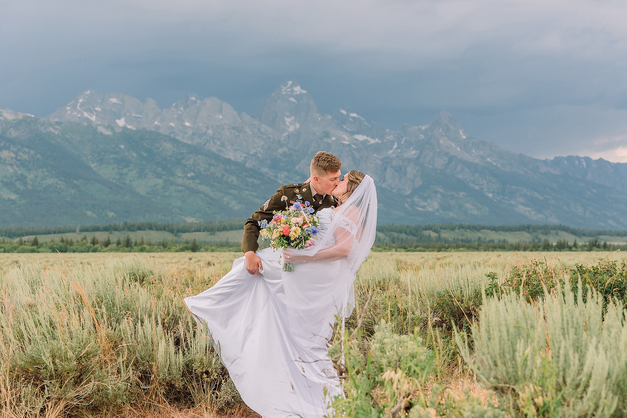 grand tetons elopement photographer summer wedding in grand teton national park eloping in jackson hole wyoming wyoming elopement photographer albright view turnout wedding photos