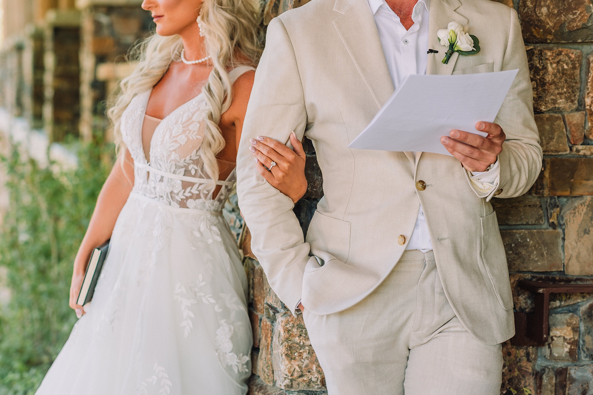 couple reads private vows to each other before wedding ceremony