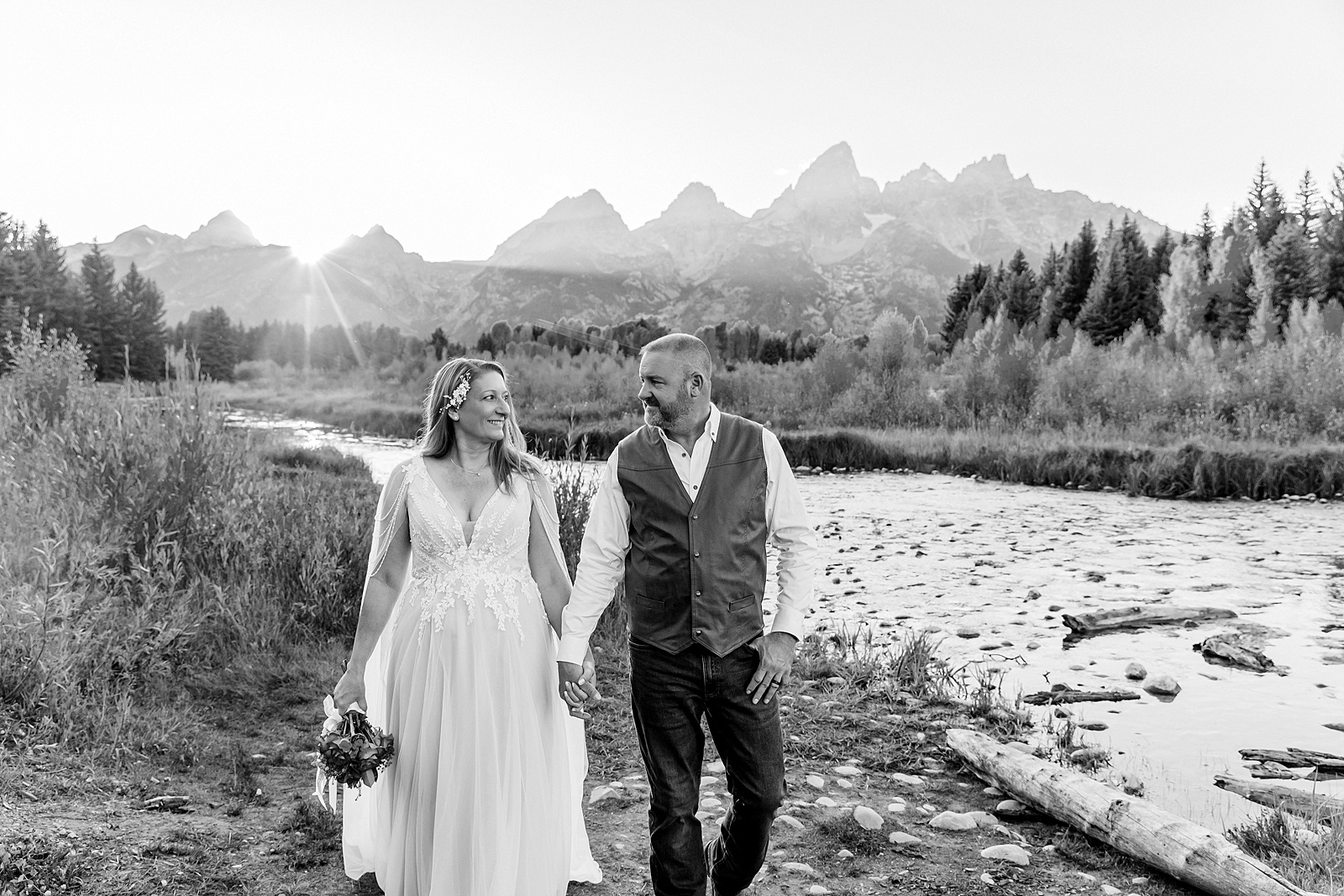 Jackson Hole honeymoon wedding photos Schwabacher Landing wedding portraits Snake River wedding photography September mountain wedding photos beaded wedding dress golden hour western groom style wedding photos Teton mountain wedding portraits sheer cape wedding dress photography