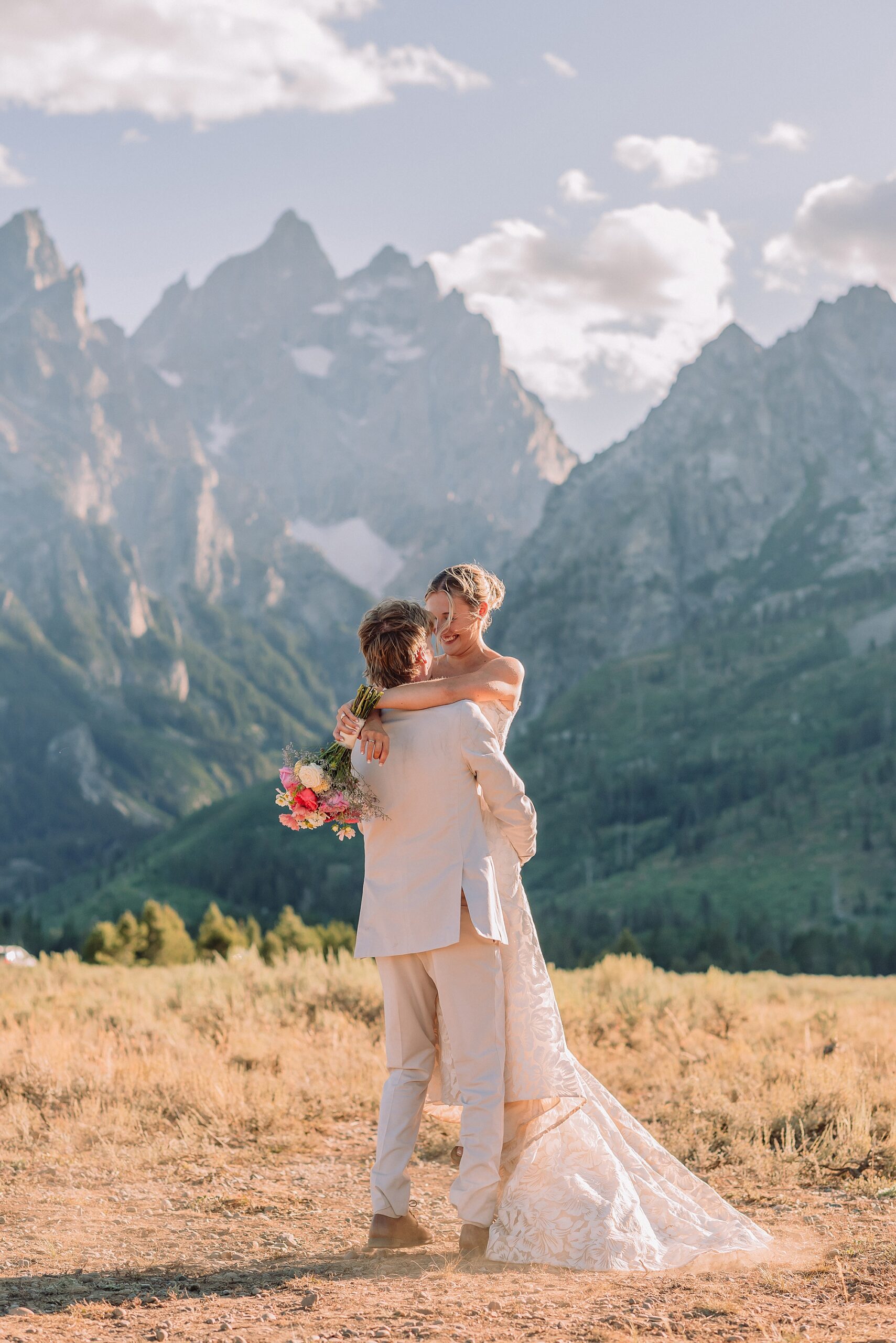 Grand Teton National Park Elopement Photographer Cathedral View Turnout elopement ceremony Grand Teton National Park bride on horse Grand Teton elopement couple running down road Grand Teton elopement Jackson Hole micro wedding photographer how to get married in grand teton national park western wedding at Cathedral View Turnout horses in western wedding jackson hole