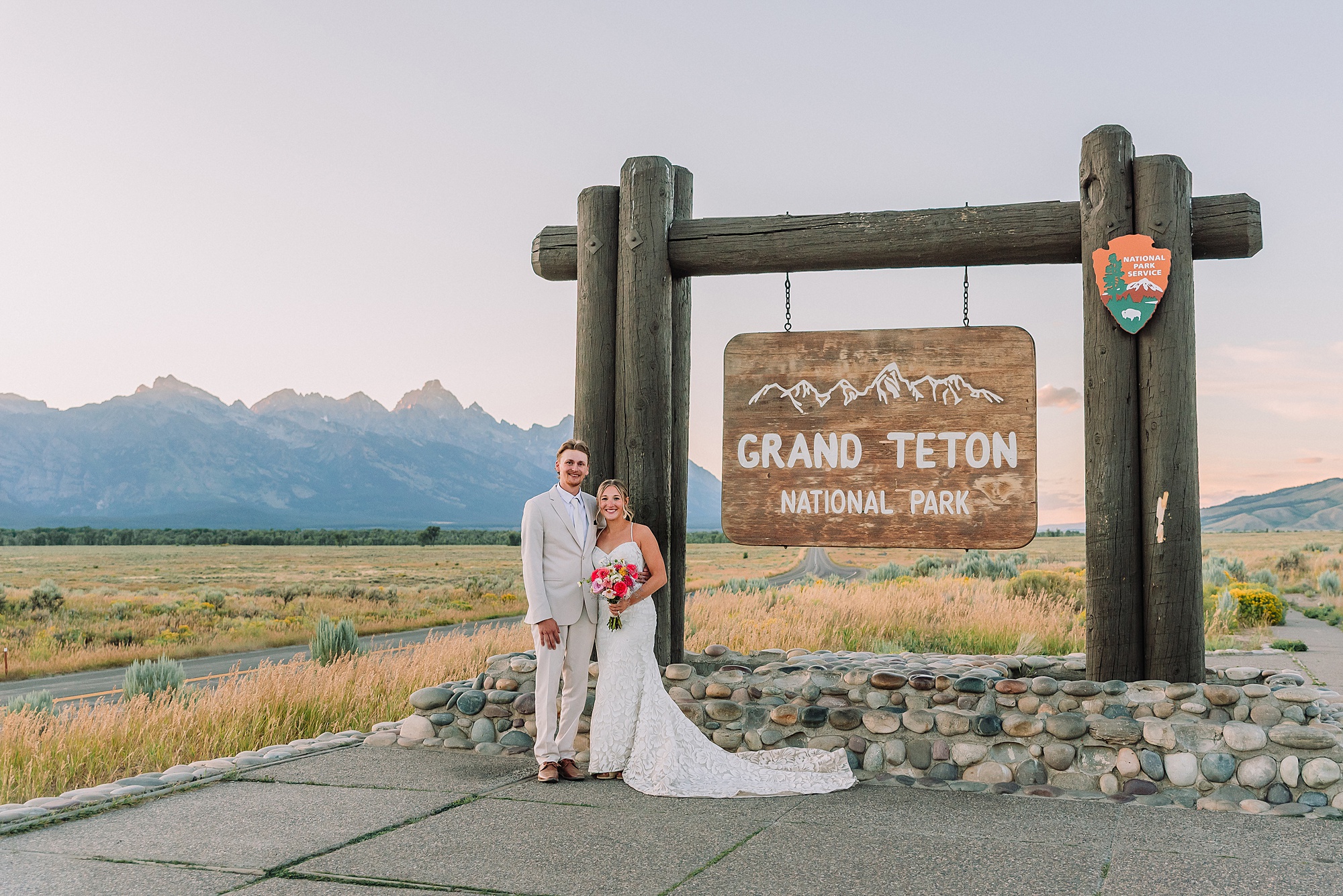 Grand Teton National Park sign elopement photo summer elopement jackson hole wedding photography Jackson Hole Wedding Photographer destination wedding photographer for grand tetons