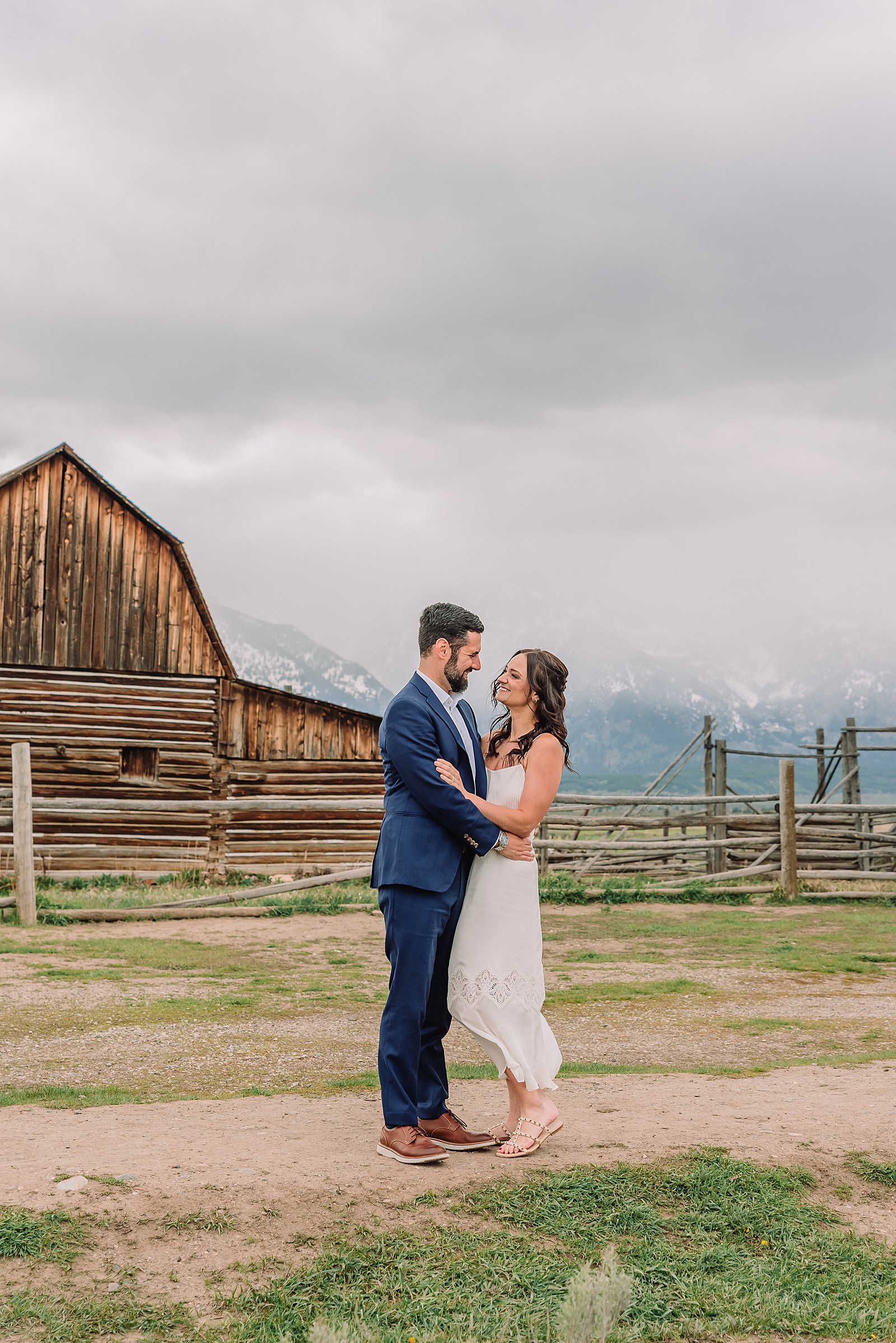 intimate anniversary photos jackson hole wyoming spring mountain vow renewal photography grand teton national park couples session romantic mountain elopement john moulton barn Jackson Hole Wyoming wedding photography historic barn couples photography Jackson Hole Wyoming