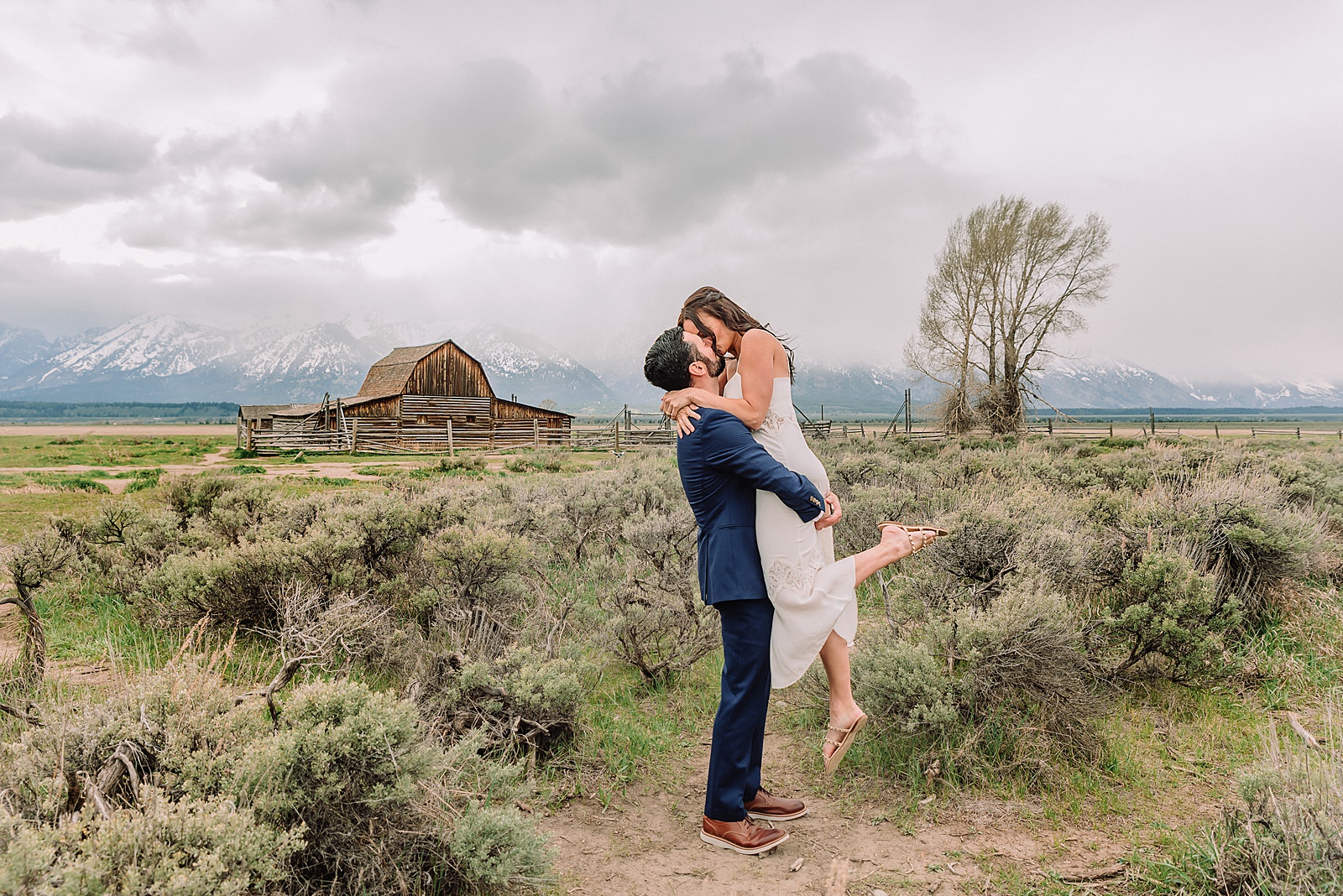intimate anniversary photos jackson hole wyoming spring mountain vow renewal photography grand teton national park couples session romantic mountain elopement john moulton barn Jackson Hole Wyoming wedding photography historic barn couples photography Jackson Hole Wyoming