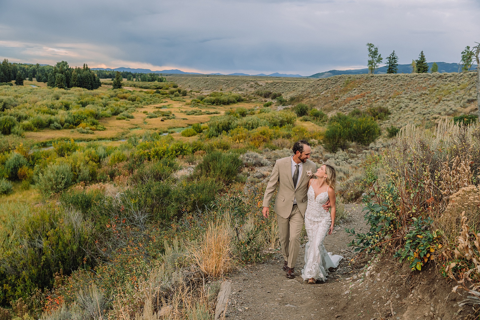 Jackson Hole micro wedding photographer Blacktail Ponds Overlook wedding portraits Wyoming Grand Teton wedding with moose wildlife September Grand Teton wedding fall colors dramatic cathedral veil sagebrush Teton backdrop