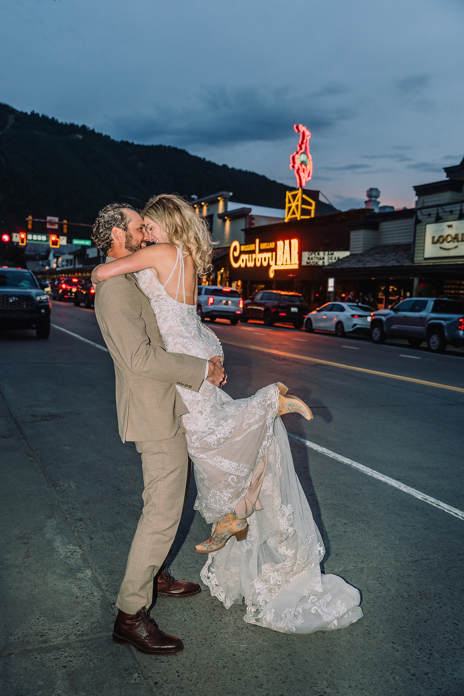 Million Dollar Cowboy Bar wedding photos neon light signage on downtown bar night time flash photography