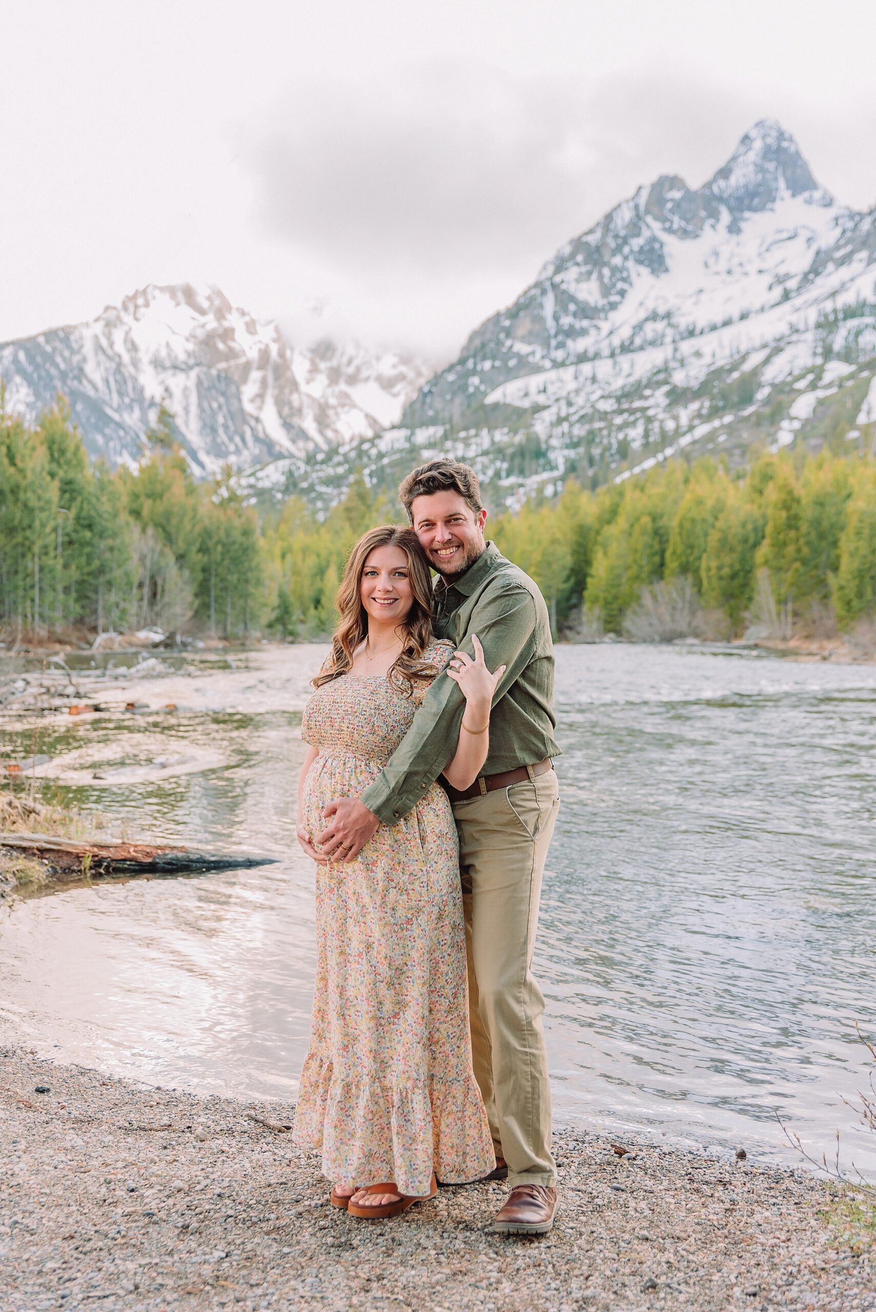 String Lake maternity photos with mountain backdrop String Lake pregnancy photos with water reflection Pregnant couple photos in Jackson Hole Wyoming May maternity photo session Grand Teton National Park Jackson Hole Family Photographer