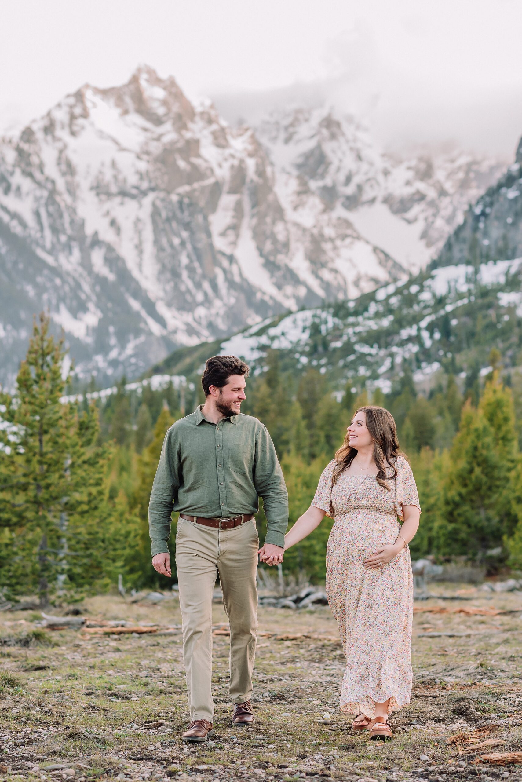 String Lake maternity photos with mountain backdrop String Lake pregnancy photos with water reflection Pregnant couple photos in Jackson Hole Wyoming May maternity photo session Grand Teton National Park Jackson Hole Family Photographer