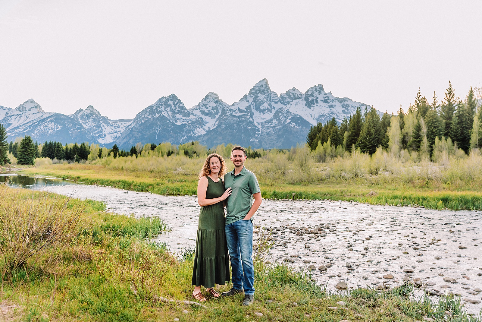 Schwabacher Landing sunset couples photography session green dress couples photos Schwabacher Landing reflections Teton mountain backdrop engagement photos Wyoming Jackson Hole Photographer Jackson Hole Couples Photography