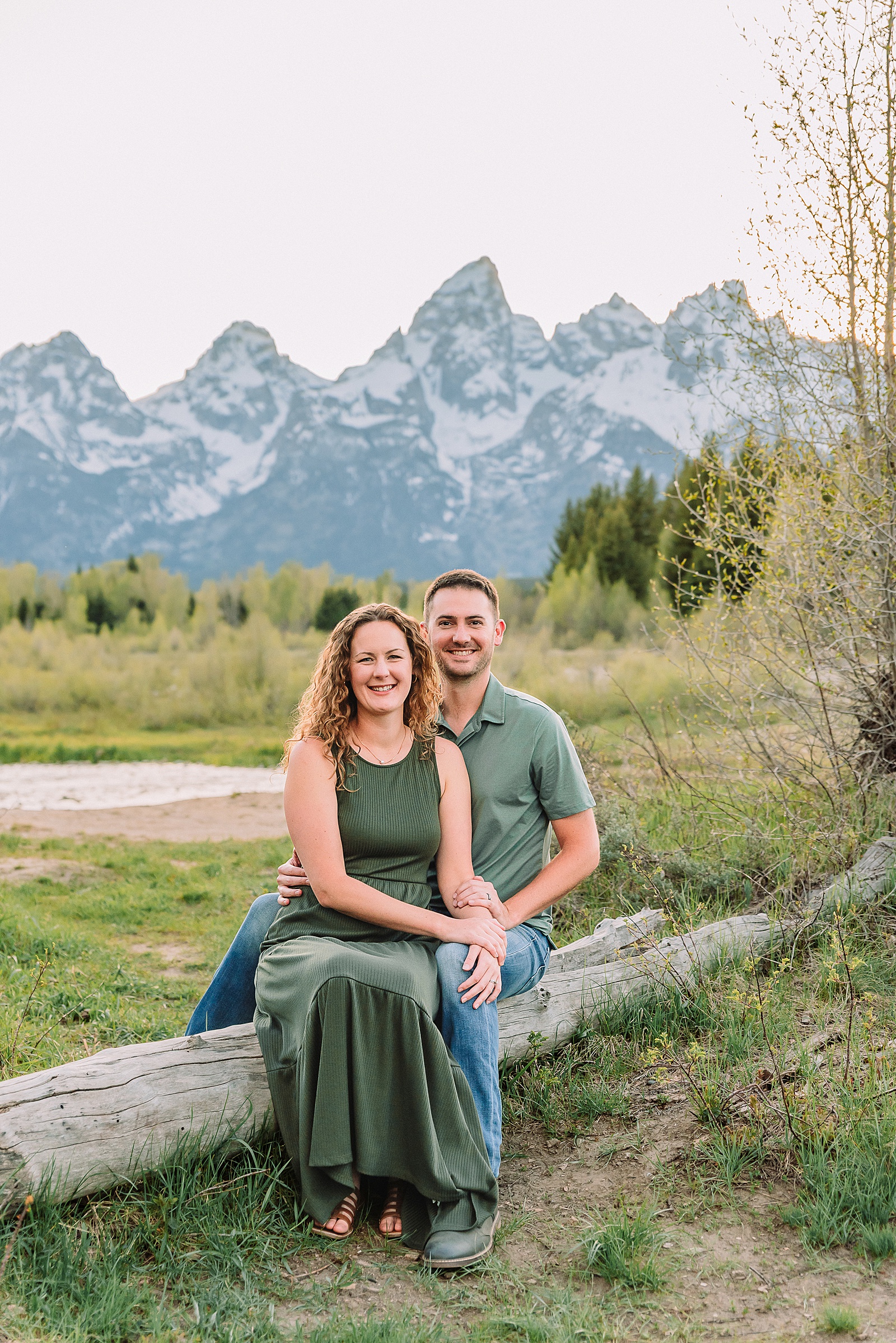 Schwabacher Landing sunset couples photography session green dress couples photos Schwabacher Landing reflections Teton mountain backdrop engagement photos Wyoming Jackson Hole Photographer Jackson Hole Couples Photography