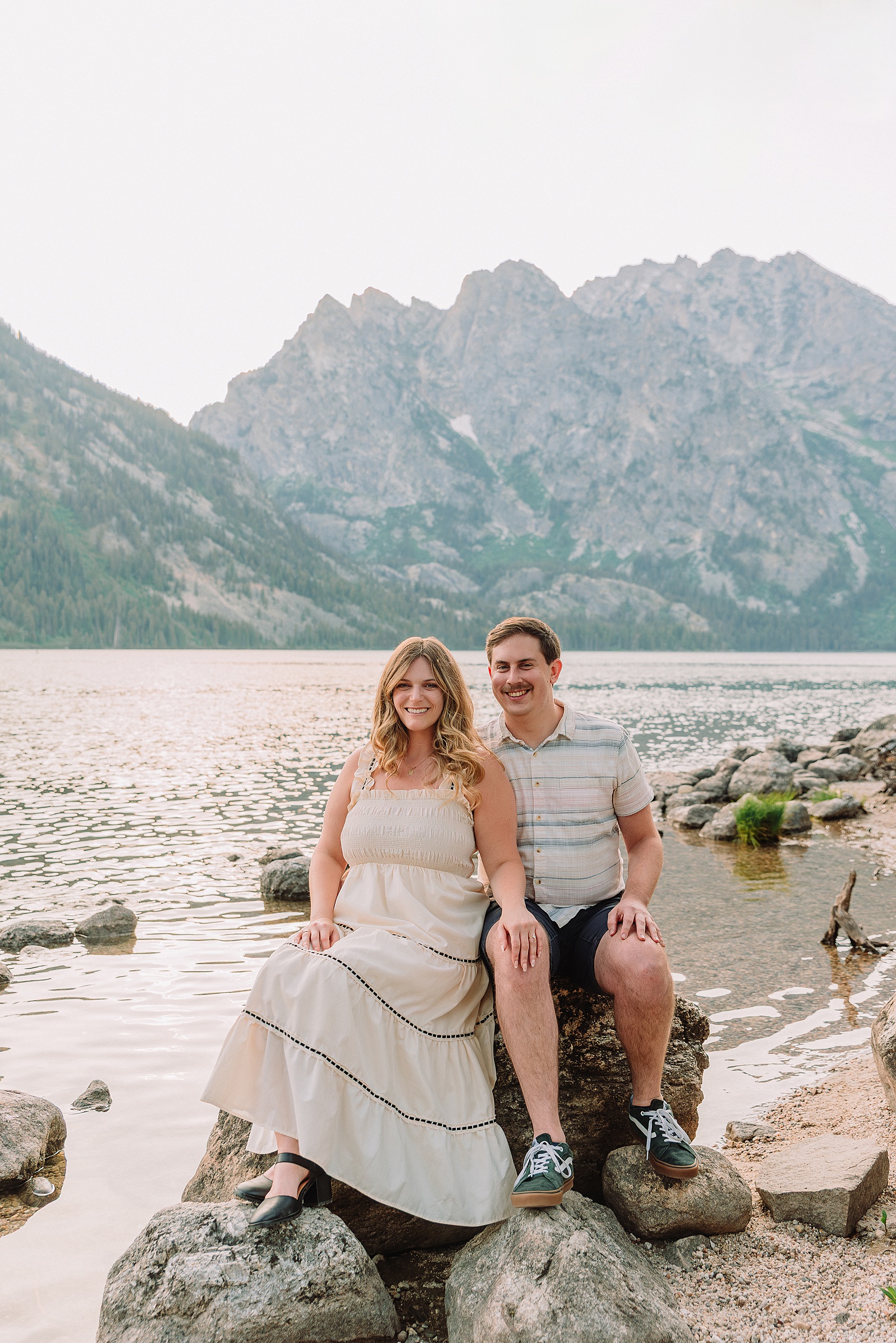 Jackson Hole engagement photos at Jenny Lake Grand Teton proposal photographer Jenny Lake Lodge engagement session mountain proposal photography Wyoming lakeside couple photos grand teton national park