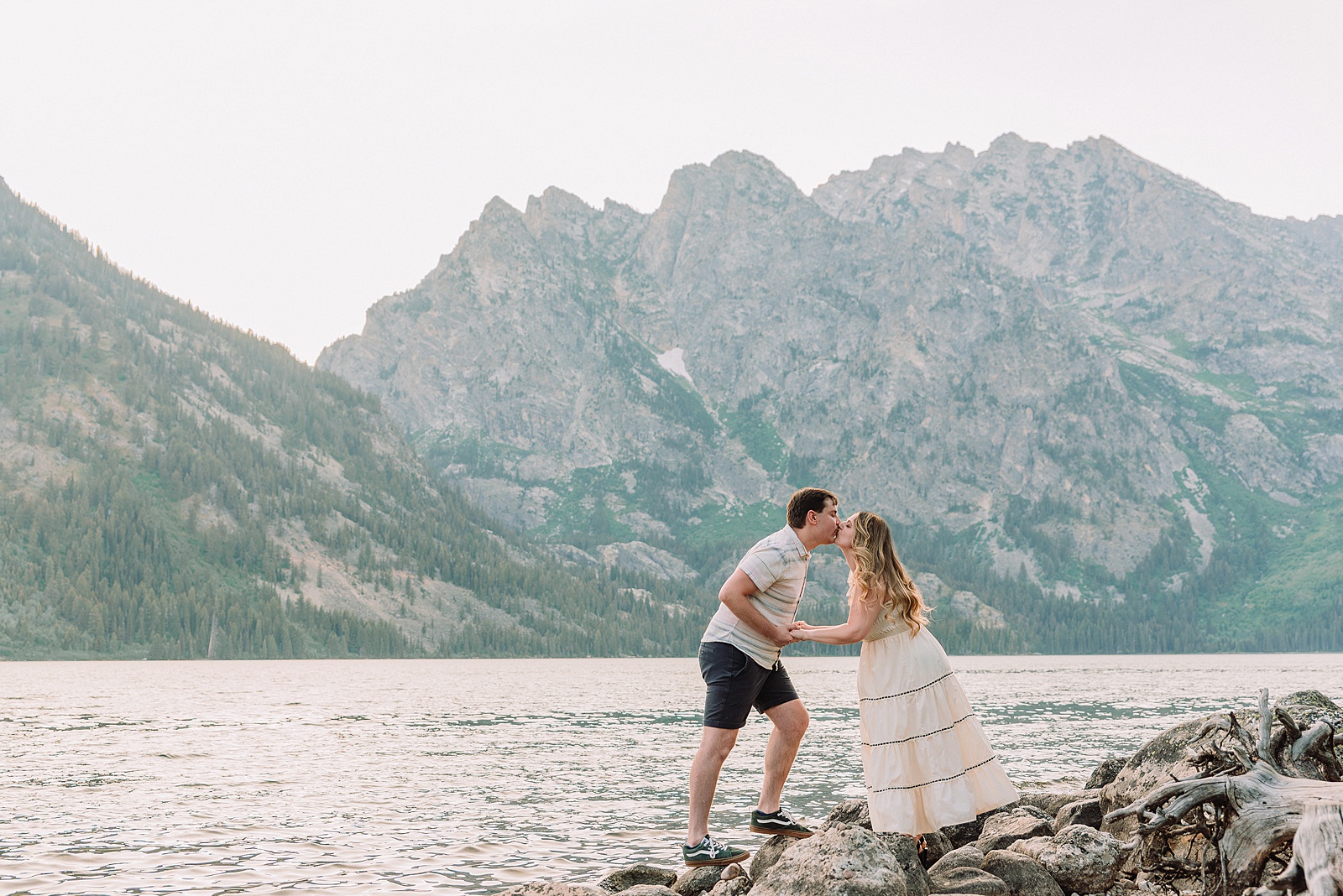 Jackson Hole engagement photos at Jenny Lake Grand Teton proposal photographer Jenny Lake Lodge engagement session mountain proposal photography Wyoming lakeside couple photos grand teton national park