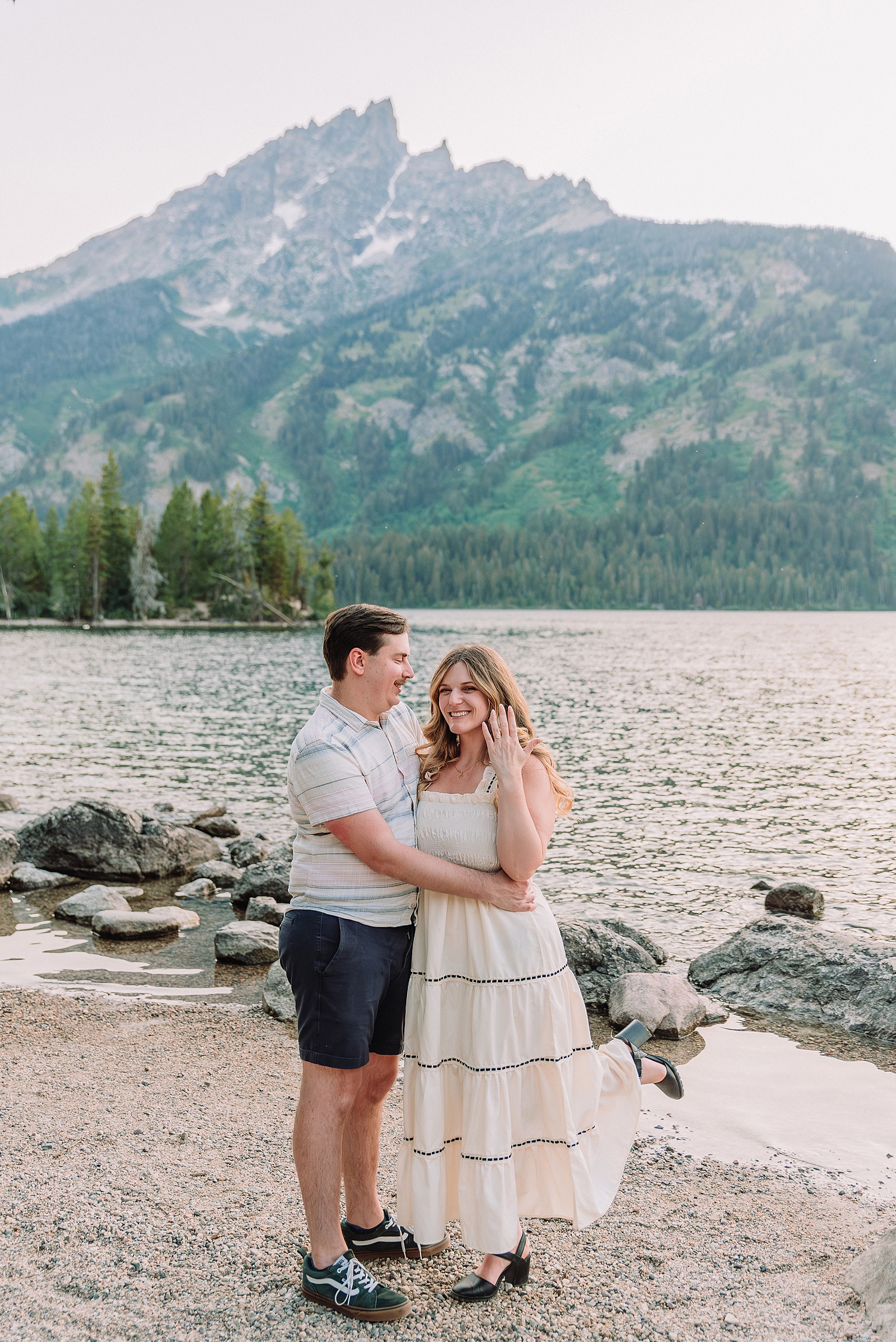 Jackson Hole Engagement Photographer grand teton national park proposal photography lakeside engagement portraits Jackson Hole surprise proposal photographer Grand Tetons Jenny Lake couple photos summer romantic Jackson Hole engagement session