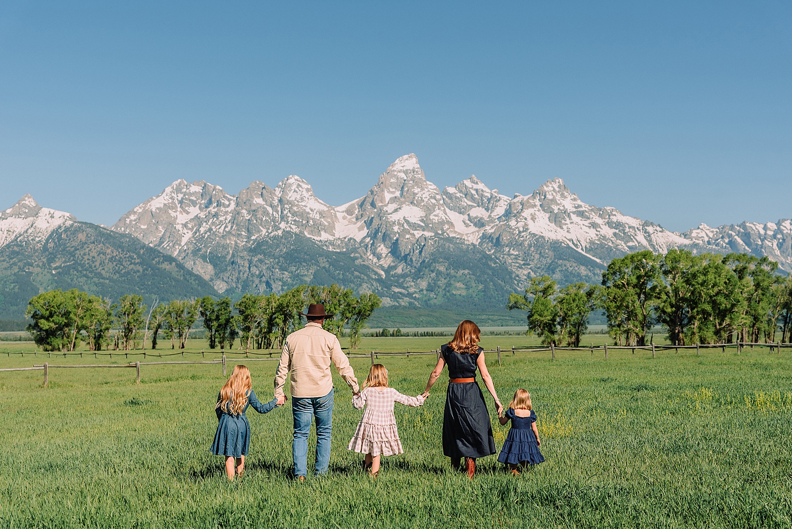 Jackson Hole mountain family photography session coordinated family outfits for mountain photos summer family photography Grand Teton National Park Grand Teton Family Photographer