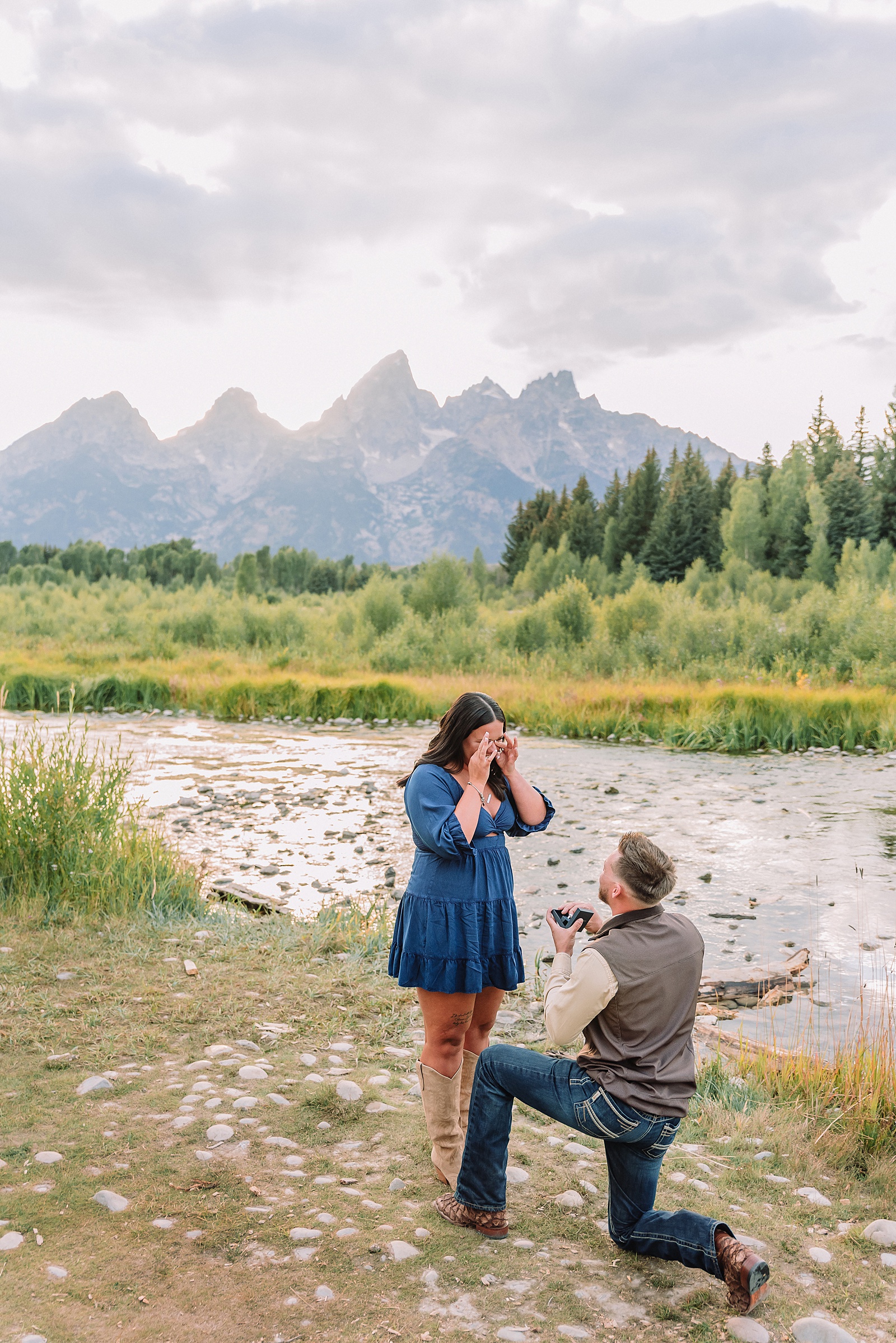 Jackson Hole engagement photos along Snake River surprise proposal reaction photography Wyoming Schwabacher Landing proposal photos romantic Jackson Hole couple photography