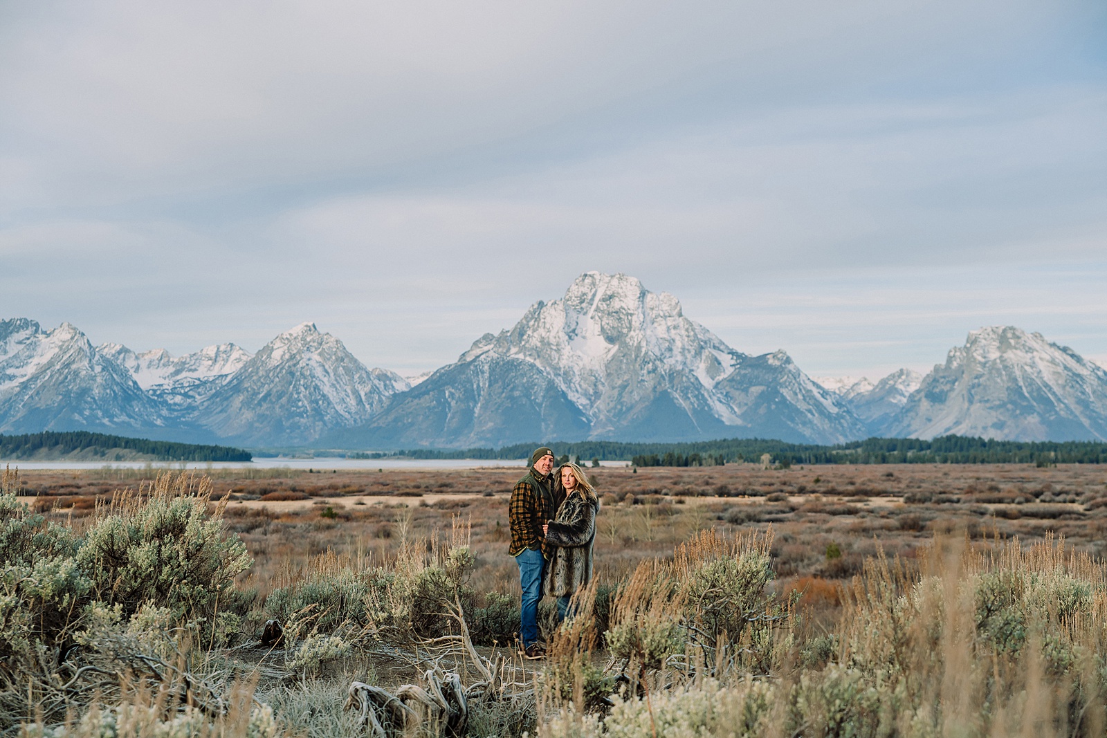 willow flats anniversary session with teton mountain views fall anniversary photos with aspen trees jackson hole jackson hole anniversary photographer capturing love stories luxury anniversary photography willow flats jackson lake views