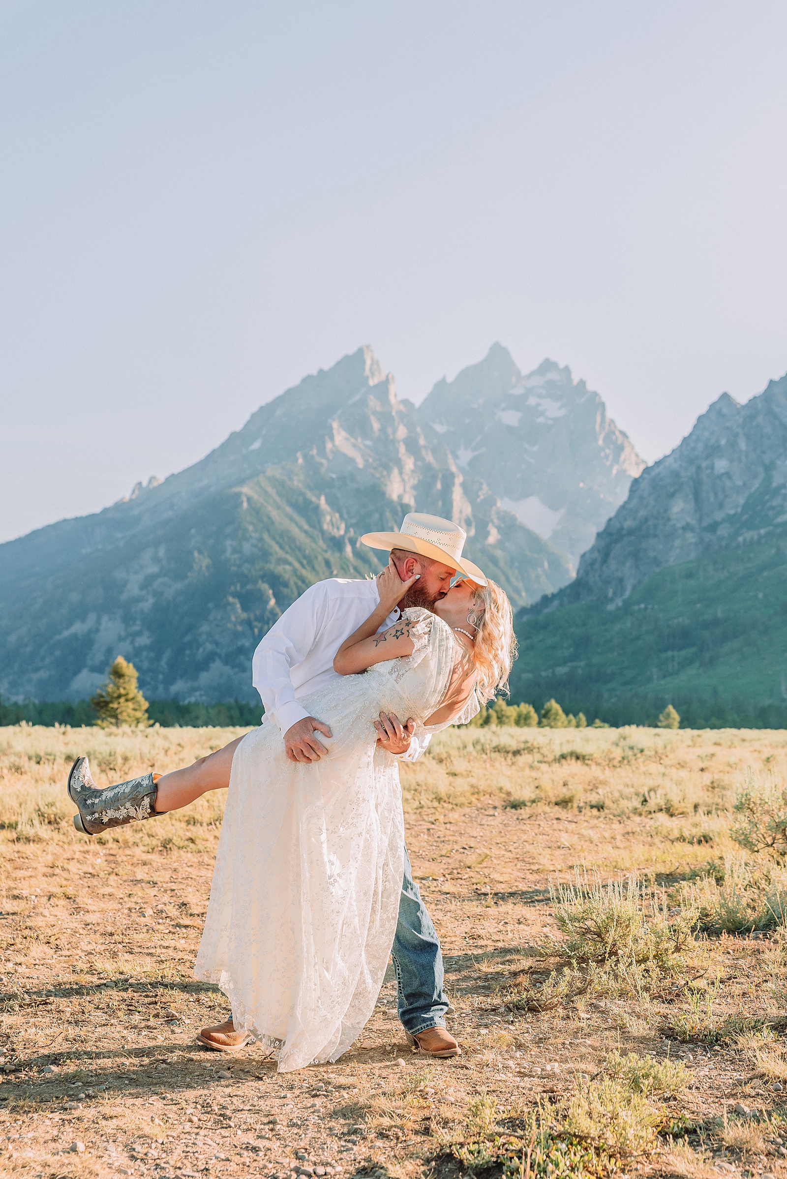 Jackson Hole vow renewal at Cathedral View Turnout intimate mountain vow renewal ceremony Wyoming 10 year anniversary vow renewal Grand Tetons beaded wedding dress mountain vow renewal Cathedral View Turnout vow renewal photographer Grand Teton National Park intimate wedding ceremony