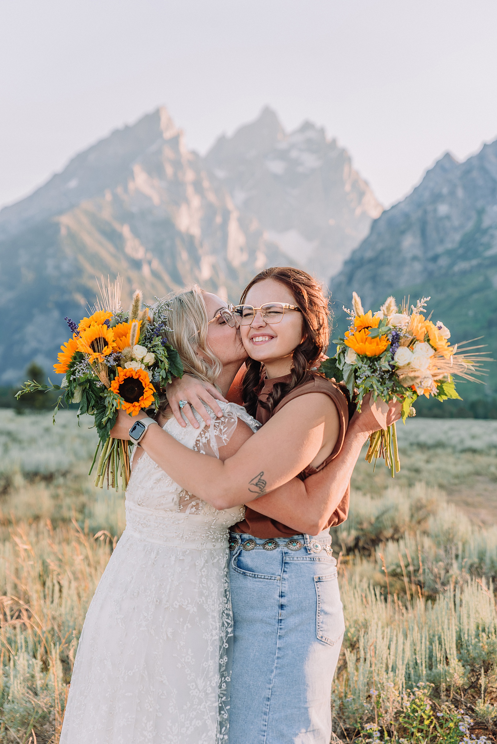 Jackson Hole vow renewal at Cathedral View Turnout intimate mountain vow renewal ceremony Wyoming 10 year anniversary vow renewal Grand Tetons beaded wedding dress mountain vow renewal Cathedral View Turnout vow renewal photographer Grand Teton National Park intimate wedding ceremony