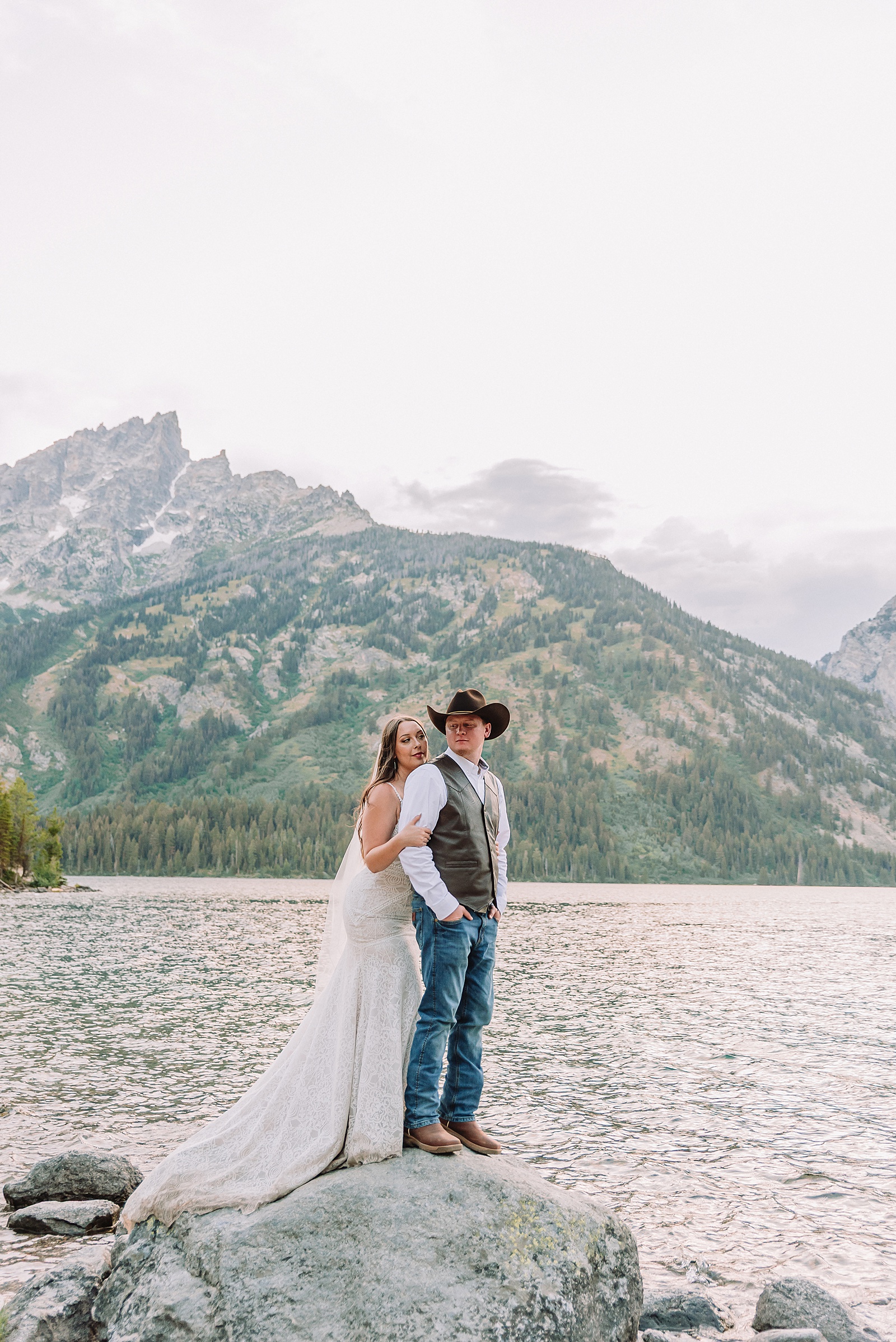 Jenny Lake Wyoming wedding photos mountain backdrop Grand Teton National Park wedding photography couple Teton mountain wedding photographer western style wedding tetons string Lake wedding photos
