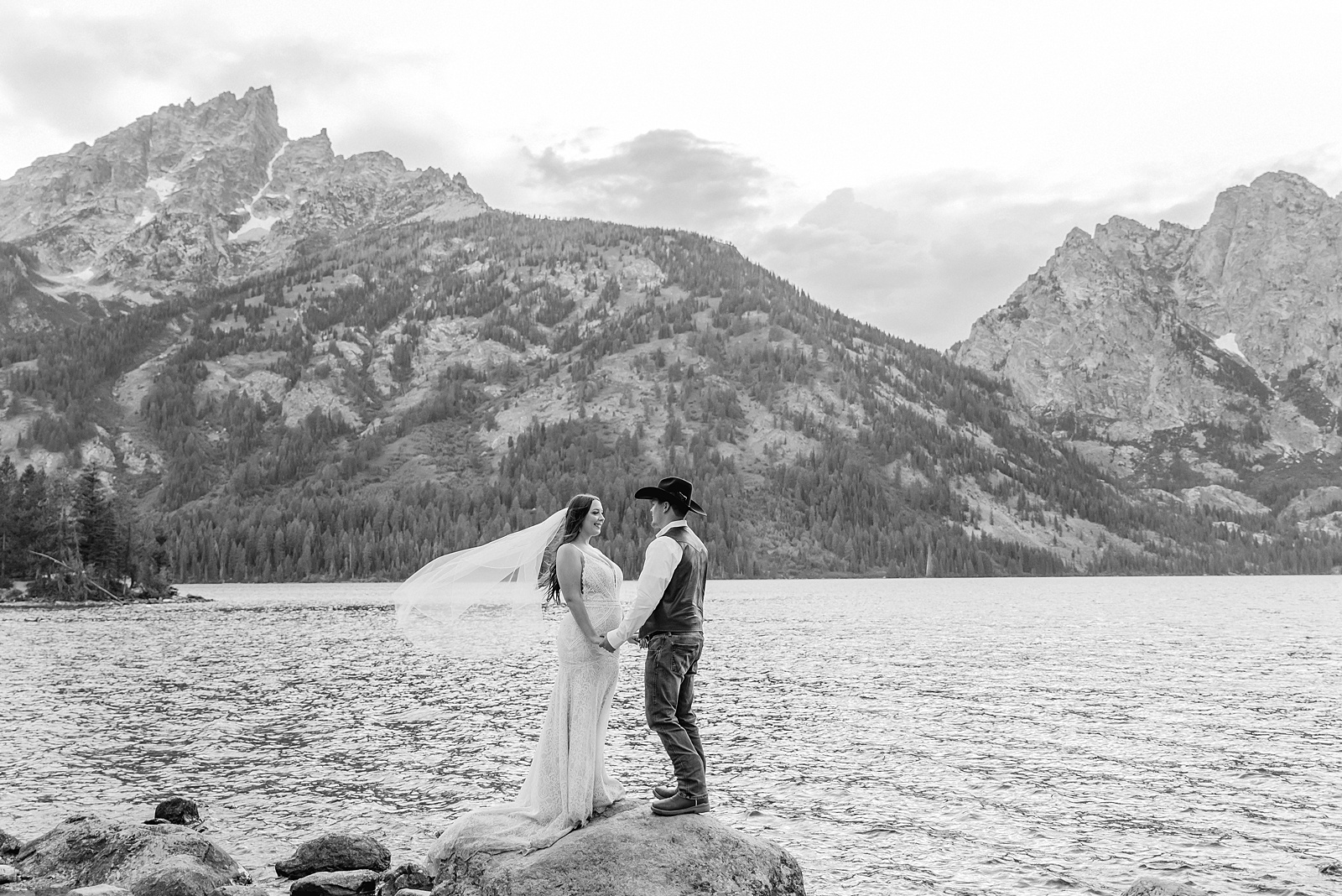 Jenny Lake Wyoming wedding photos mountain backdrop Grand Teton National Park wedding photography couple Teton mountain wedding photographer western style wedding tetons string Lake wedding photos