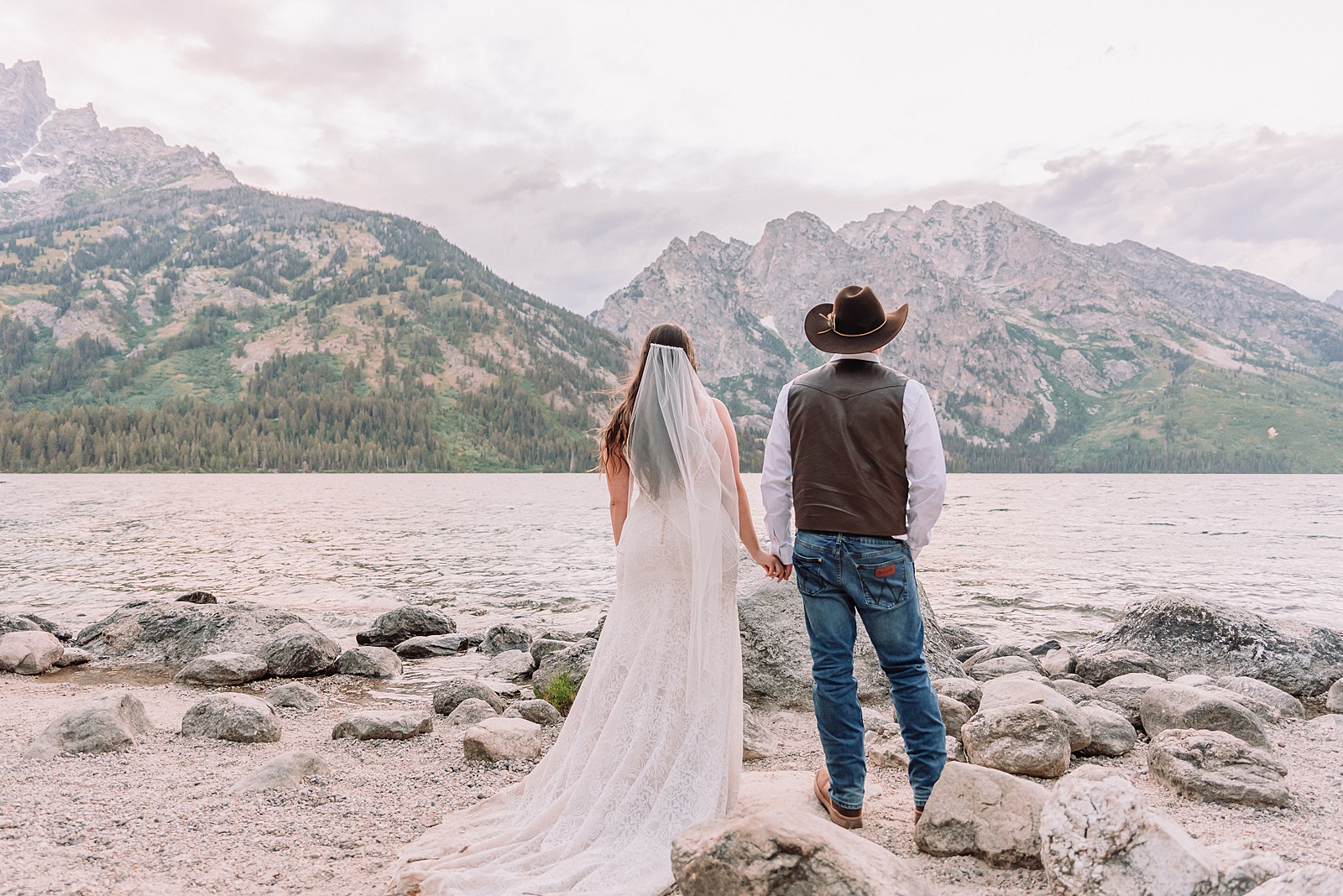 Jenny Lake Wyoming wedding photos mountain backdrop Grand Teton National Park wedding photography couple Teton mountain wedding photographer western style wedding tetons string Lake wedding photos