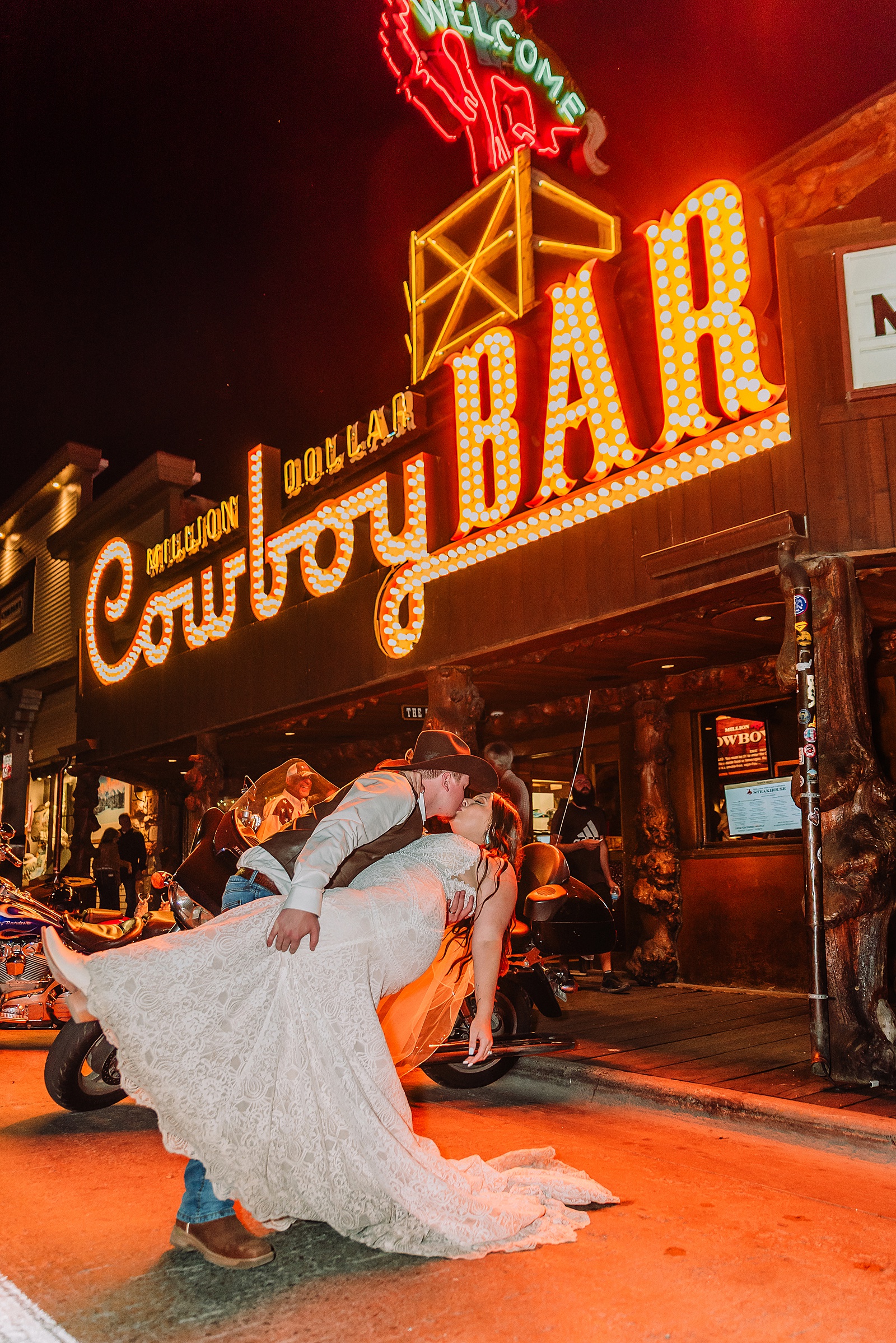 Million Dollar Cowboy Bar wedding photos Million Dollar Cowboy Bar neon sign wedding photos Jackson Hole Wedding Photographer
