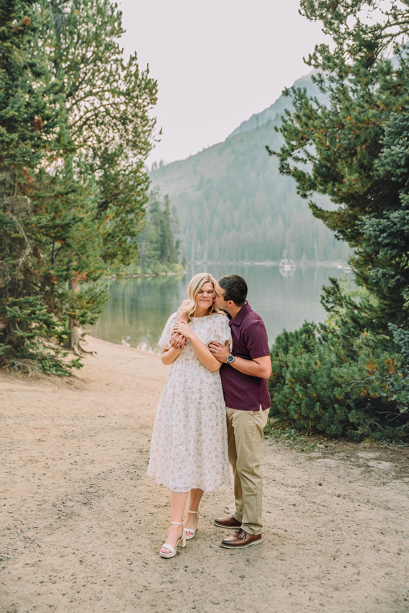 String Lake engagement photos in Grand Teton National Park Jackson Hole mountain engagement photography Teton engagement session at String Lake cream floral dress engagement photos Jackson Wyoming LDS temple wedding engagement photos Tetons fall engagement photo outfits Jackson Hole String Lake Wyoming couple photography session