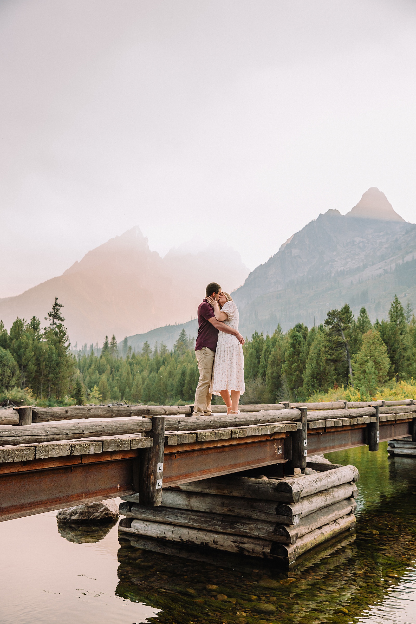 String Lake engagement photos in Grand Teton National Park Jackson Hole mountain engagement photography Teton engagement session at String Lake cream floral dress engagement photos Jackson Wyoming LDS temple wedding engagement photos Tetons fall engagement photo outfits Jackson Hole String Lake Wyoming couple photography session
