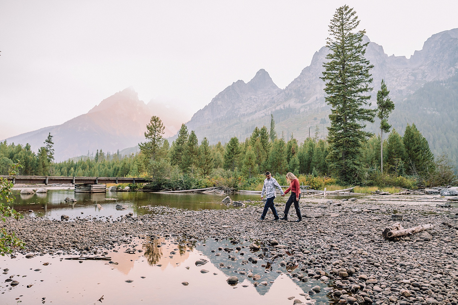 String Lake engagement photos in Grand Teton National Park Jackson Hole mountain engagement photography Teton engagement session at String Lake LDS temple wedding engagement photos Tetons fall engagement photo outfits Jackson Hole String Lake Wyoming couple photography session