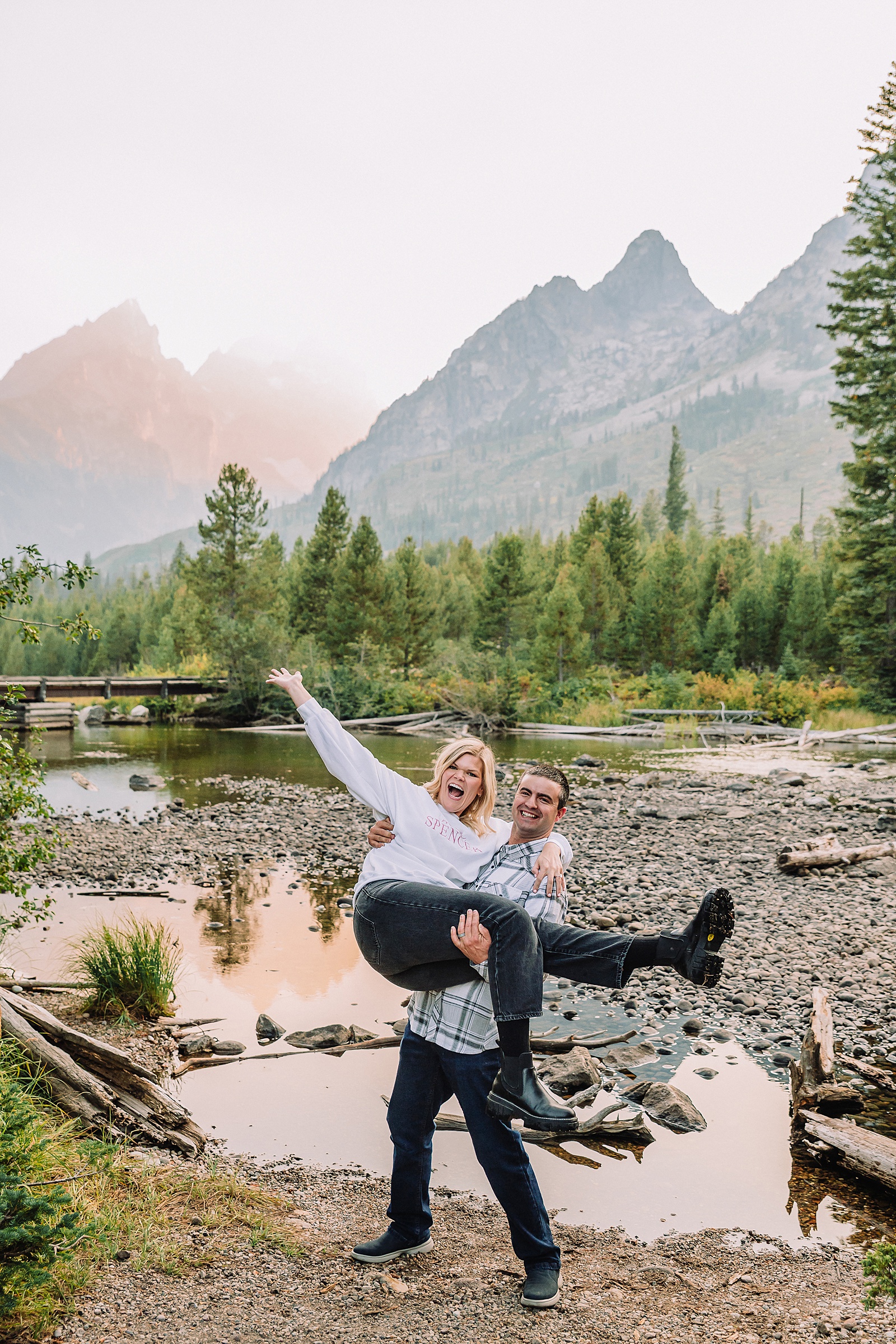 String Lake engagement photos in Grand Teton National Park Jackson Hole mountain engagement photography Teton engagement session at String Lake LDS temple wedding engagement photos Tetons fall engagement photo outfits Jackson Hole String Lake Wyoming couple photography session