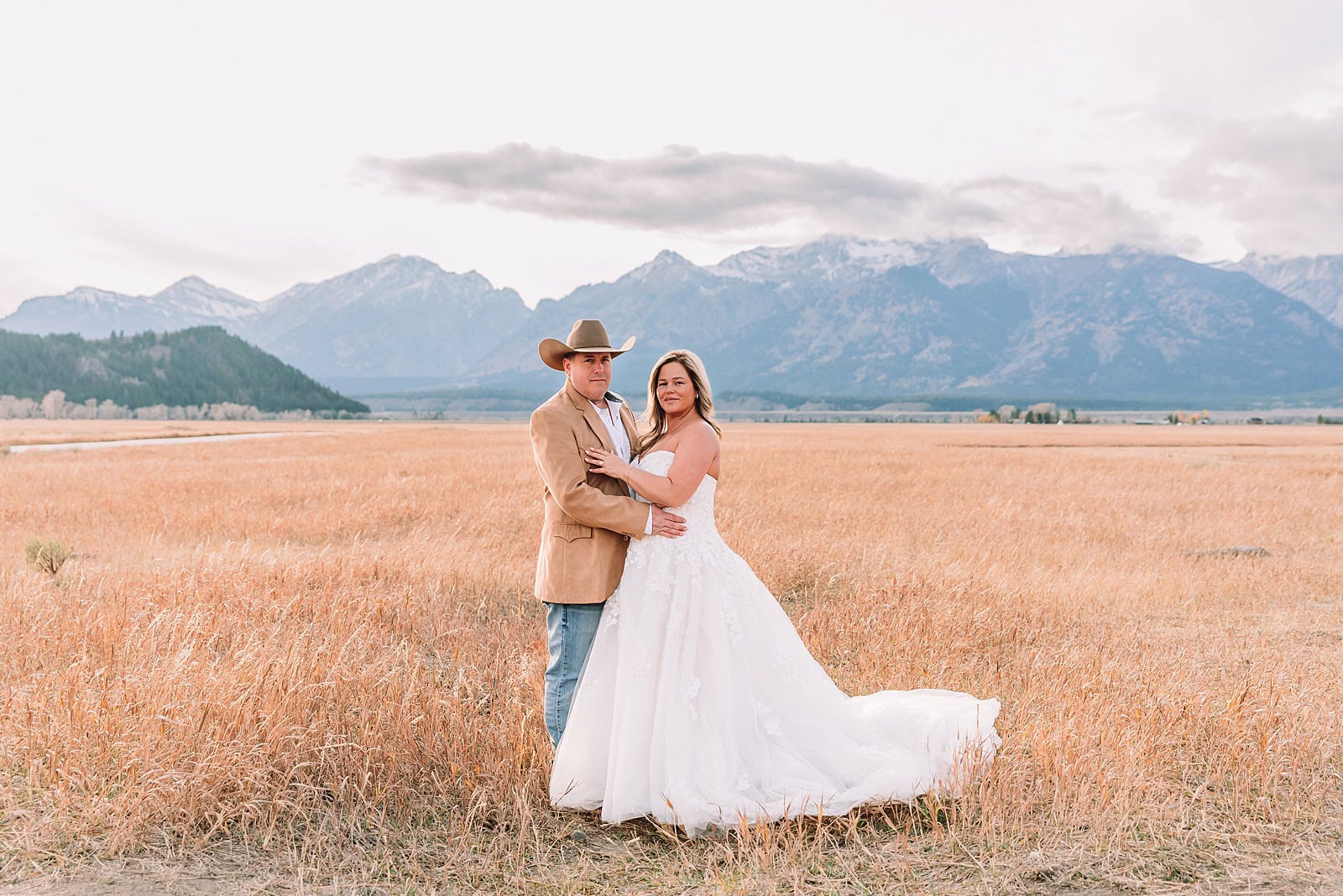 Schwabacher Landing elopement reflection photos elopement ceremony Jackson Hole October elopement at Mormon Row golden fields intimate Grand Teton elopement at Mormon Row