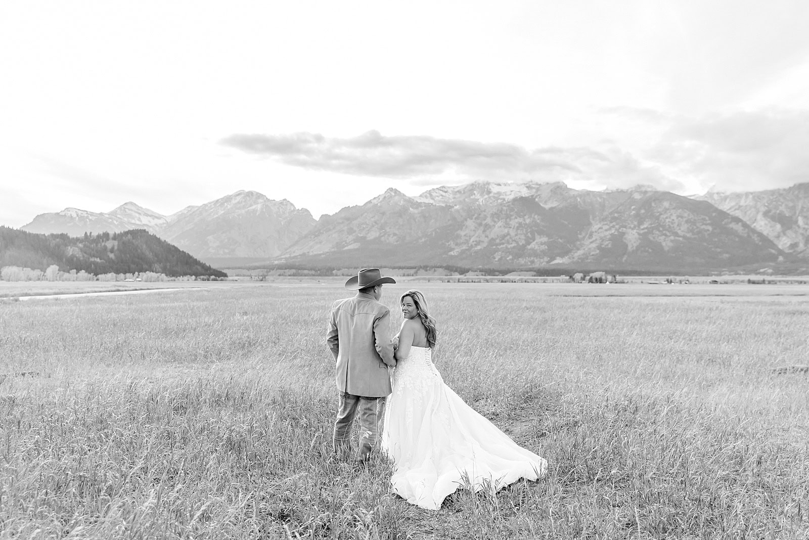 Schwabacher Landing elopement reflection photos elopement ceremony Jackson Hole October elopement at Mormon Row golden fields intimate Grand Teton elopement at Mormon Row