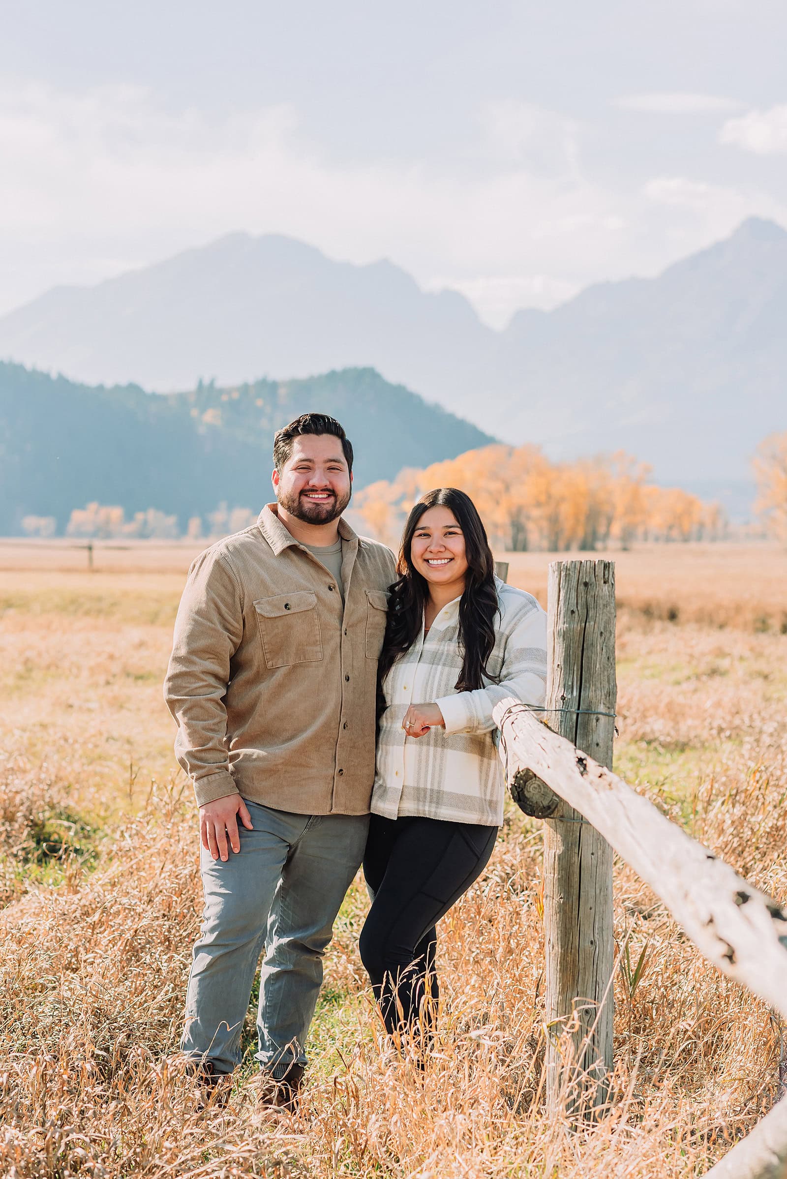 Grand Teton National Park proposal photographer Mormon Row barn proposal photos October proposal session in Jackson Hole surprise proposal at Mormon Row Tetons historic Mormon Row engagement session