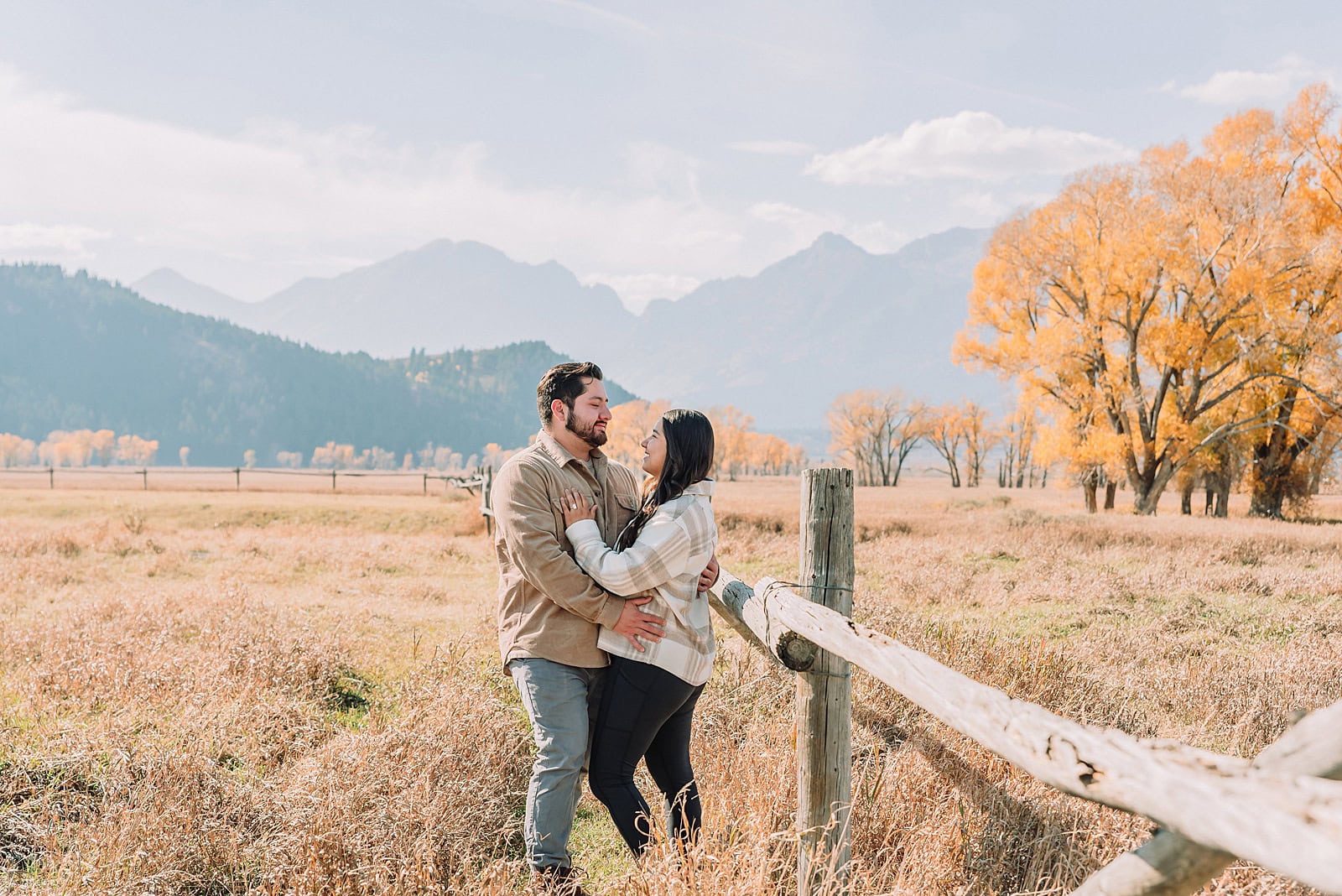 Grand Teton National Park proposal photographer Mormon Row barn proposal photos October proposal session in Jackson Hole surprise proposal at Mormon Row Tetons historic Mormon Row engagement session