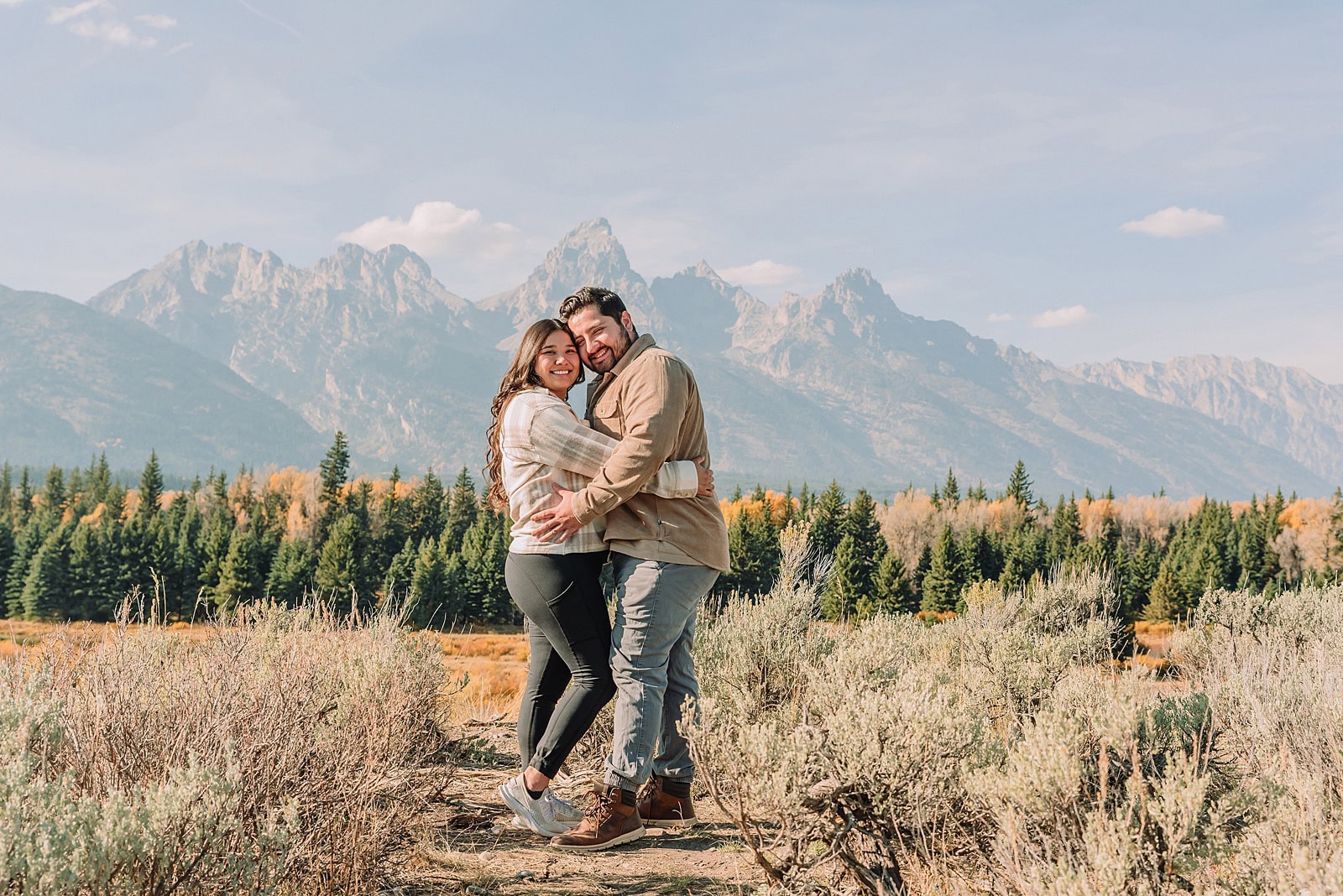 October proposal session in Jackson Hole Blacktail Ponds Overlook engagement photos mid-day proposal photography Grand Tetons fall proposal photographer Jackson Hole Wyoming