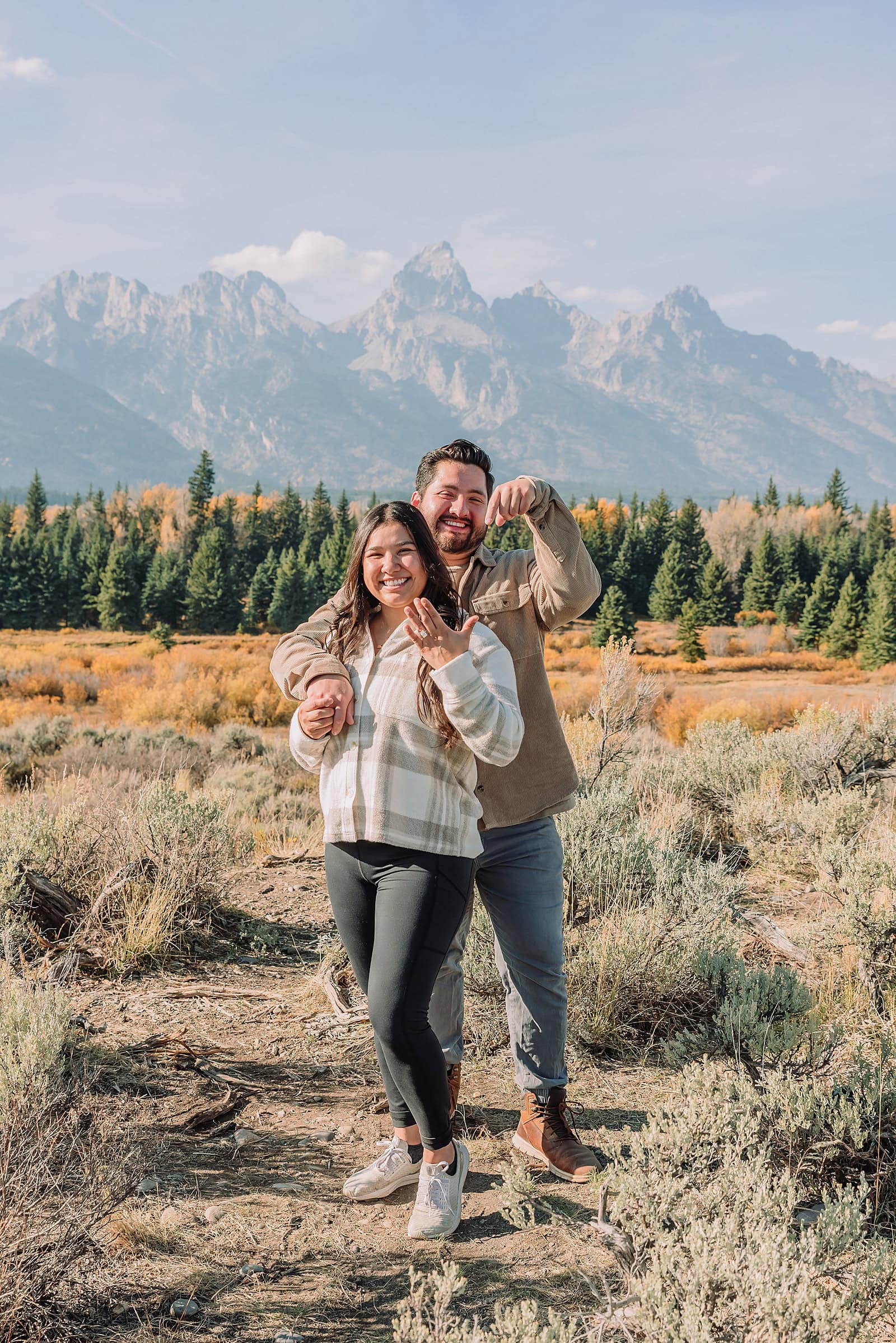 October proposal session in Jackson Hole Blacktail Ponds Overlook engagement photos mid-day proposal photography Grand Tetons fall proposal photographer Jackson Hole Wyoming