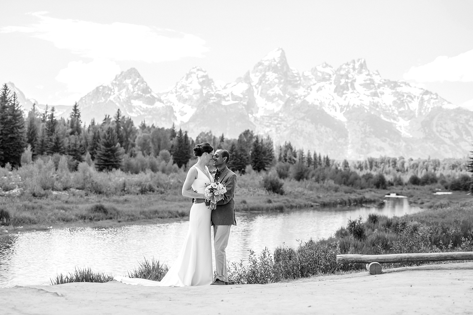 intimate elopement photography Schwabacher Landing champagne toast at Wyoming elopement personalized coffee mug elopement surprise mountain wedding with snow capped Teton peaks Jackson Hole destination wedding photographer Grand Teton elopement photography session