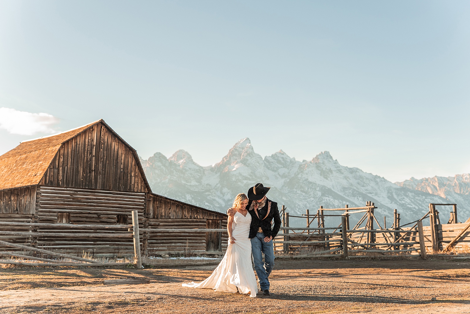 Mormon Row wedding portraits golden hour Rustic mountain wedding with Teton backdrop Cowboy themed groom style mountain wedding Vintage barn wedding photos Jackson Hole