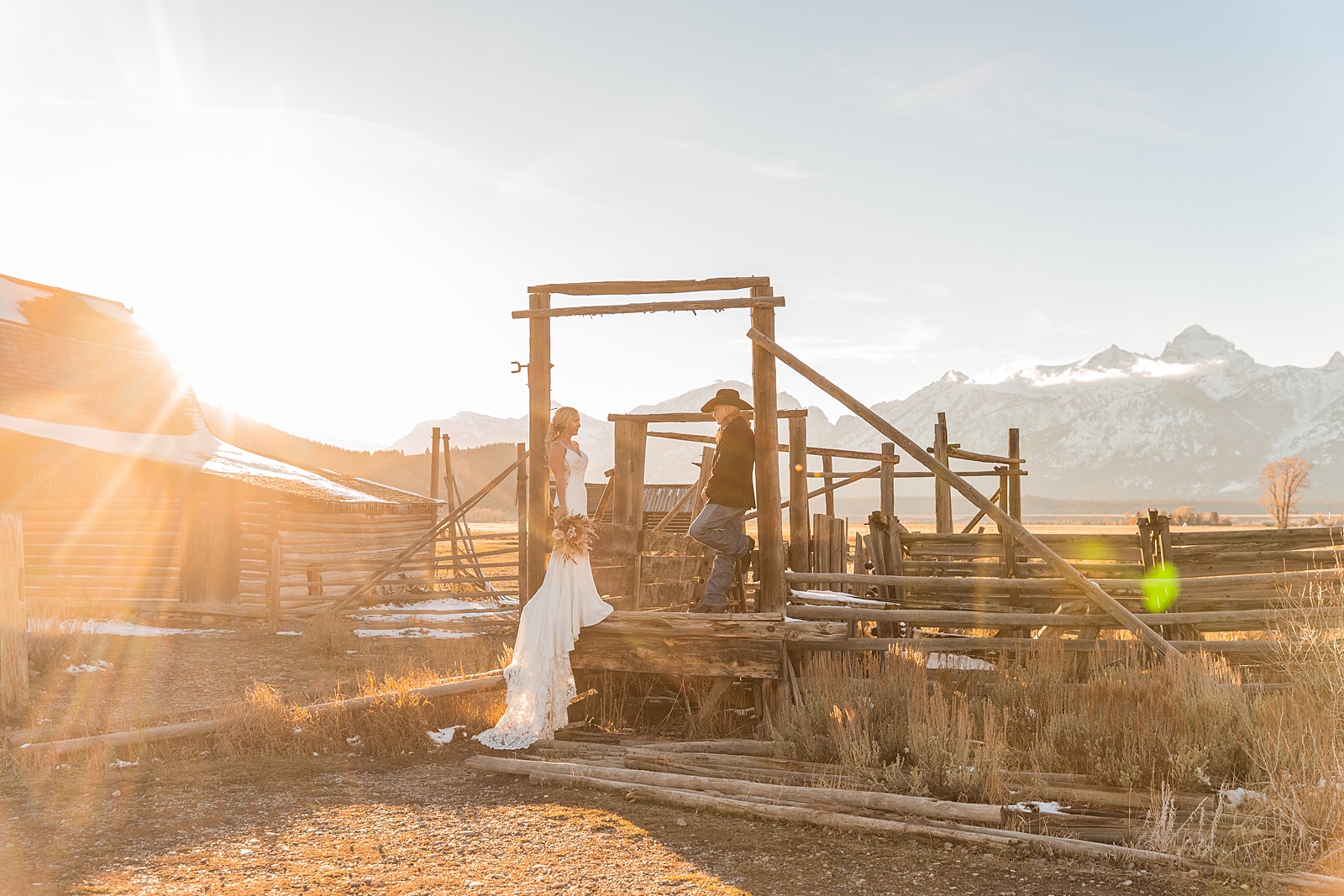 Mormon Row wedding portraits golden hour Rustic mountain wedding with Teton backdrop Cowboy themed groom style mountain wedding Vintage barn wedding photos Jackson Hole