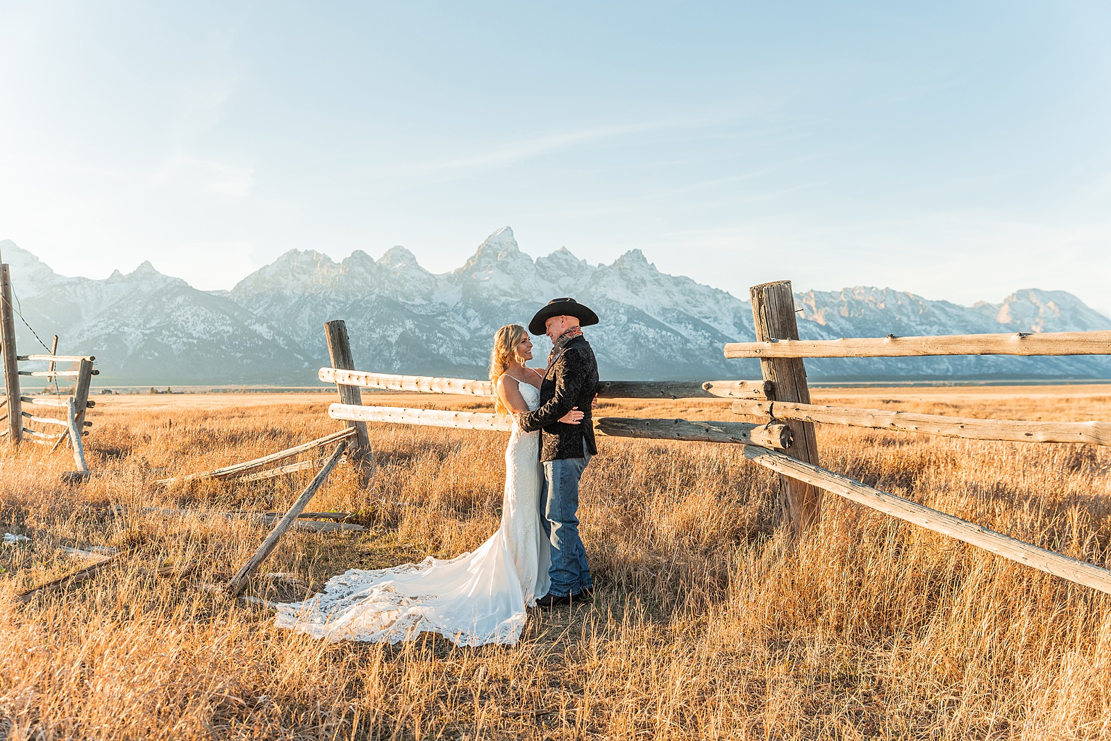 Mormon Row wedding portraits golden hour Rustic mountain wedding with Teton backdrop Cowboy themed groom style mountain wedding Vintage barn wedding photos Jackson Hole